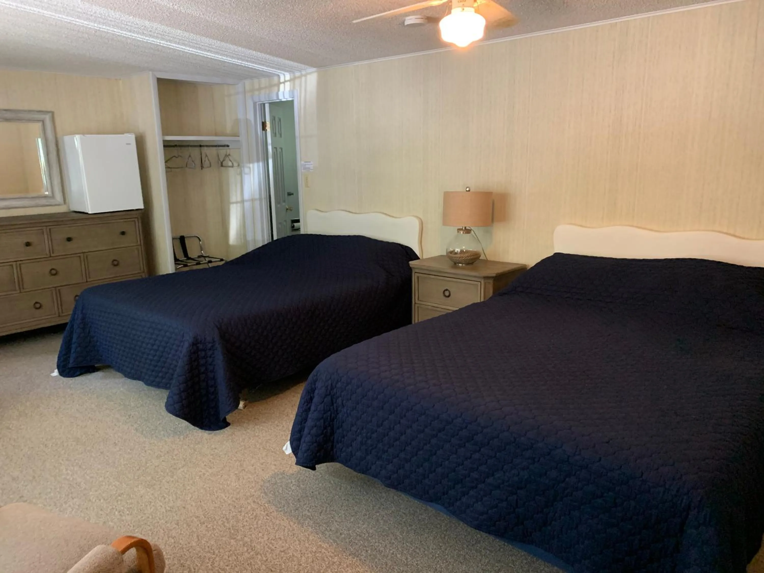 Bed in West Winds Motel & Cottages