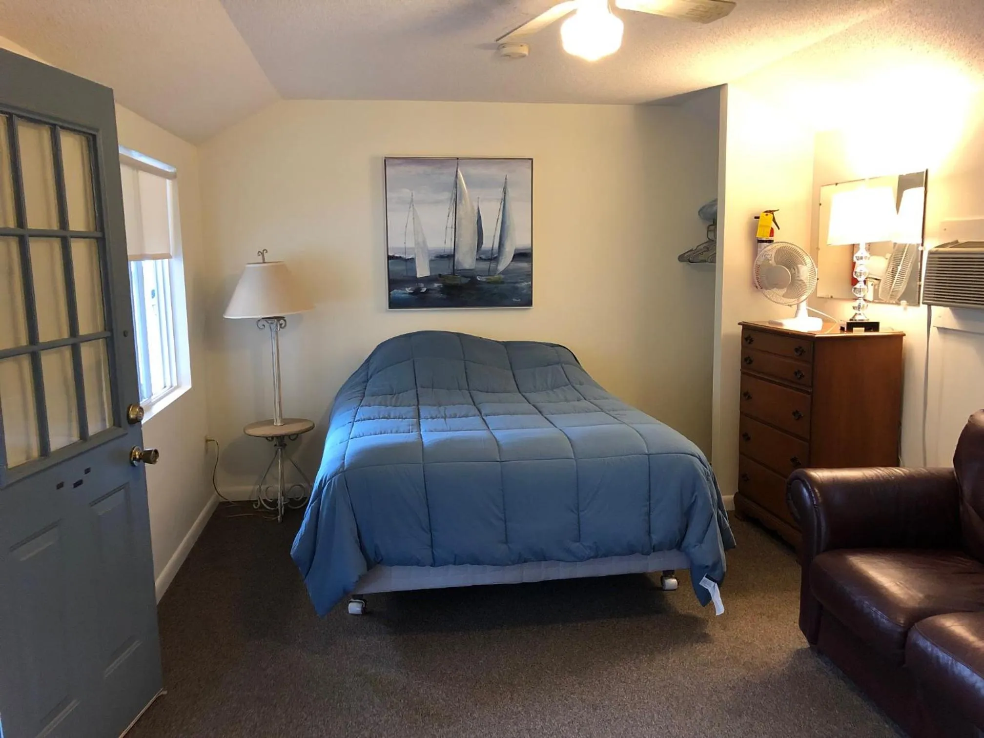 Bed in West Winds Motel & Cottages