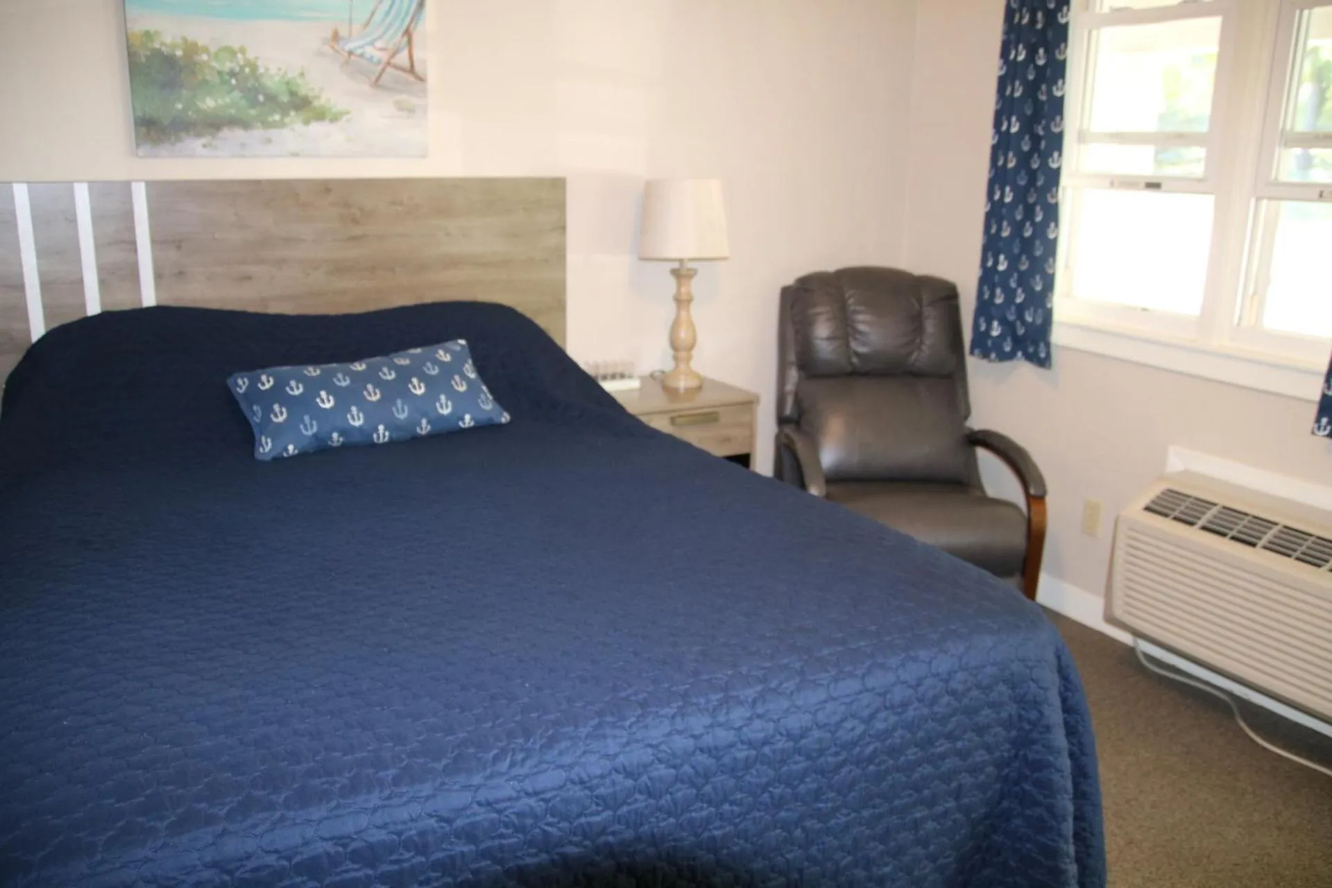 Bed in West Winds Motel & Cottages