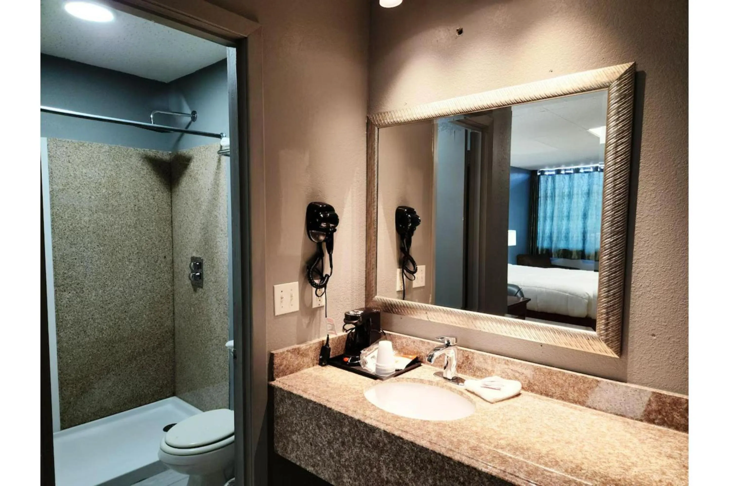 Bathroom in Executive Inn By OYO Queenville Mena