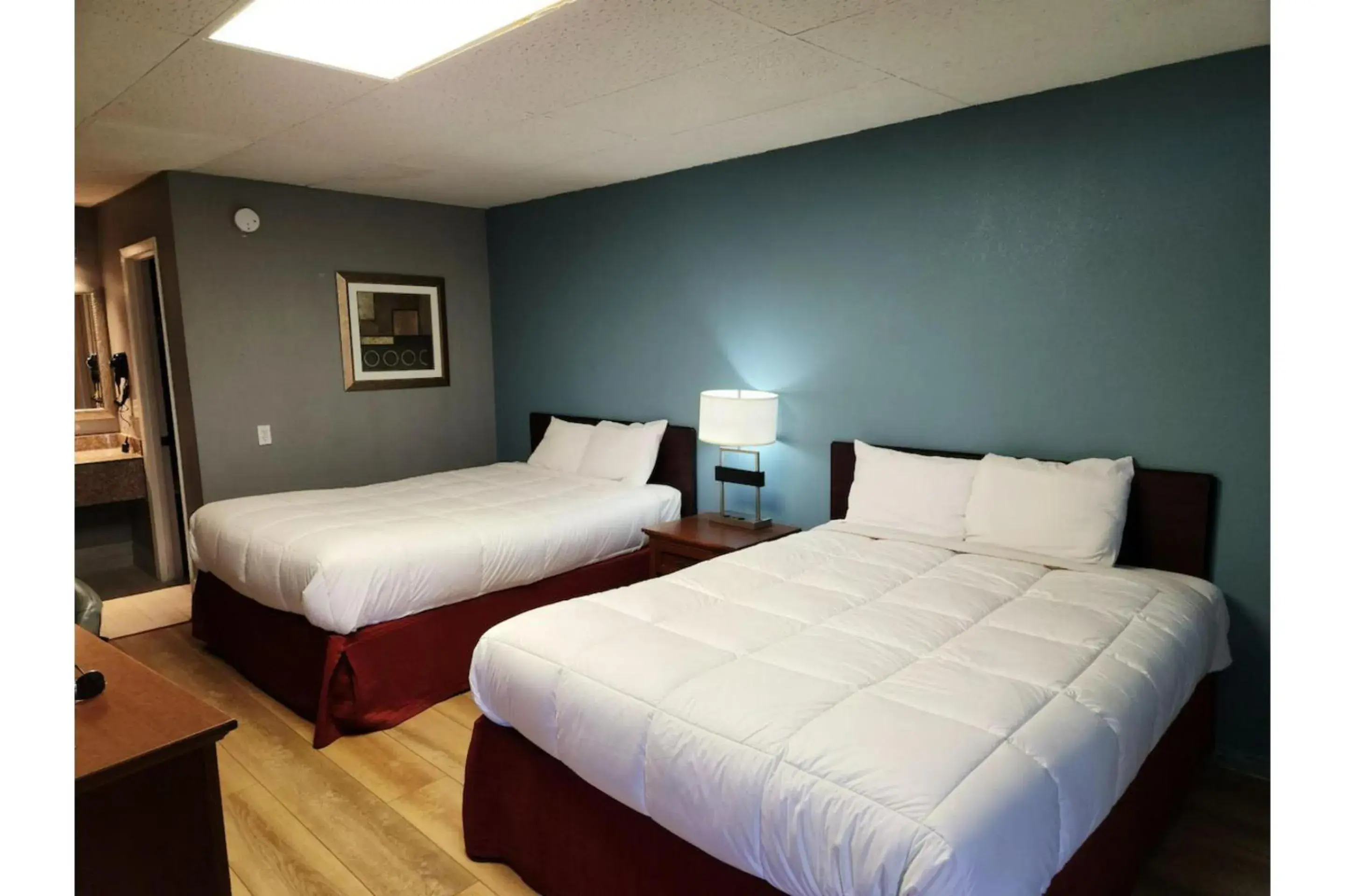 Bedroom, Bed in Executive Inn By OYO Queenville Mena Bedroom, Bed in Executive Inn By OYO Queenville Mena