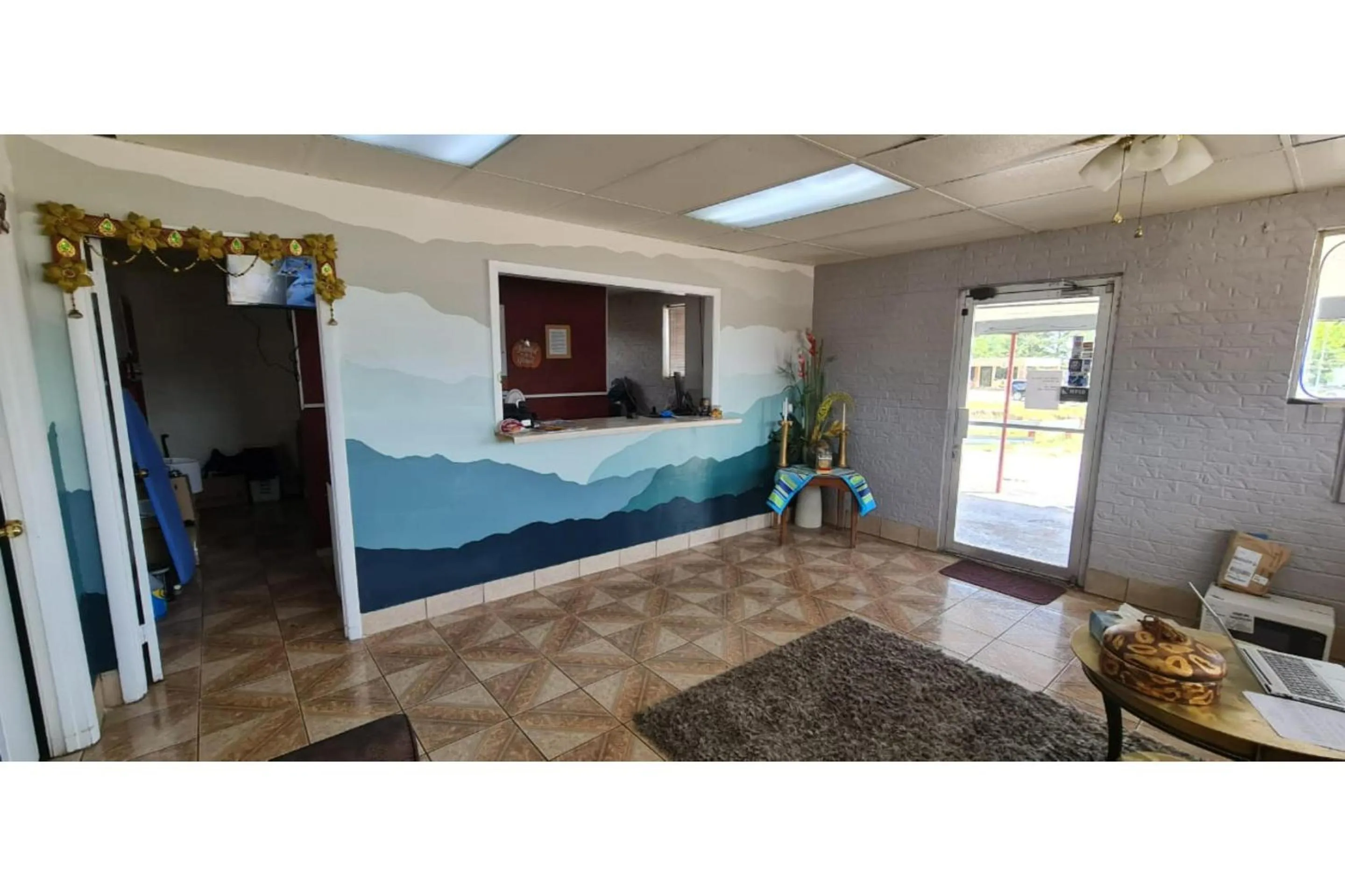 Lobby or reception in Executive Inn By OYO Queenville Mena