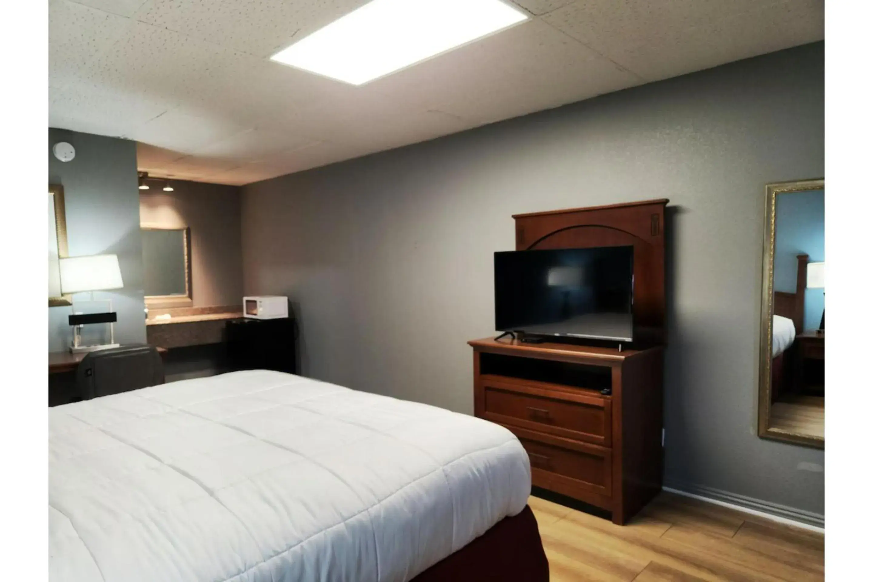 Bedroom, Bed in Executive Inn By OYO Queenville Mena Bedroom, Bed in Executive Inn By OYO Queenville Mena