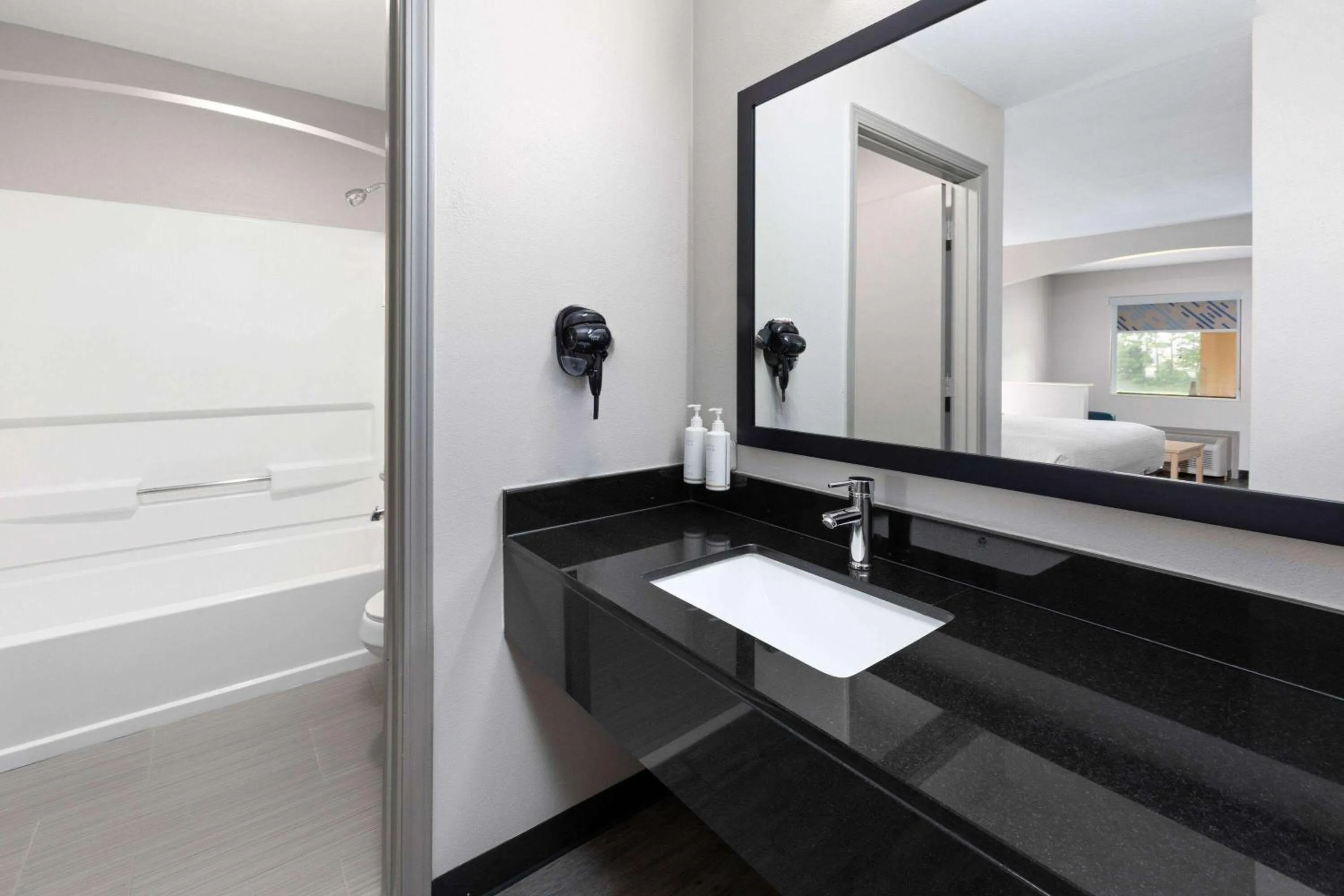 Bathroom in Days Inn by Wyndham North Little Rock Maumelle