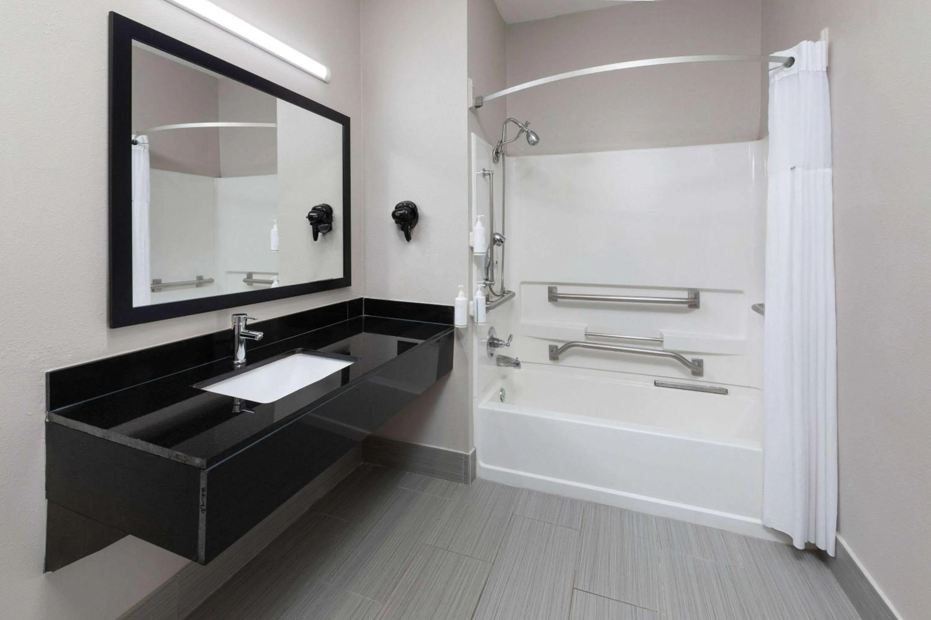 Bathroom in Days Inn by Wyndham North Little Rock Maumelle