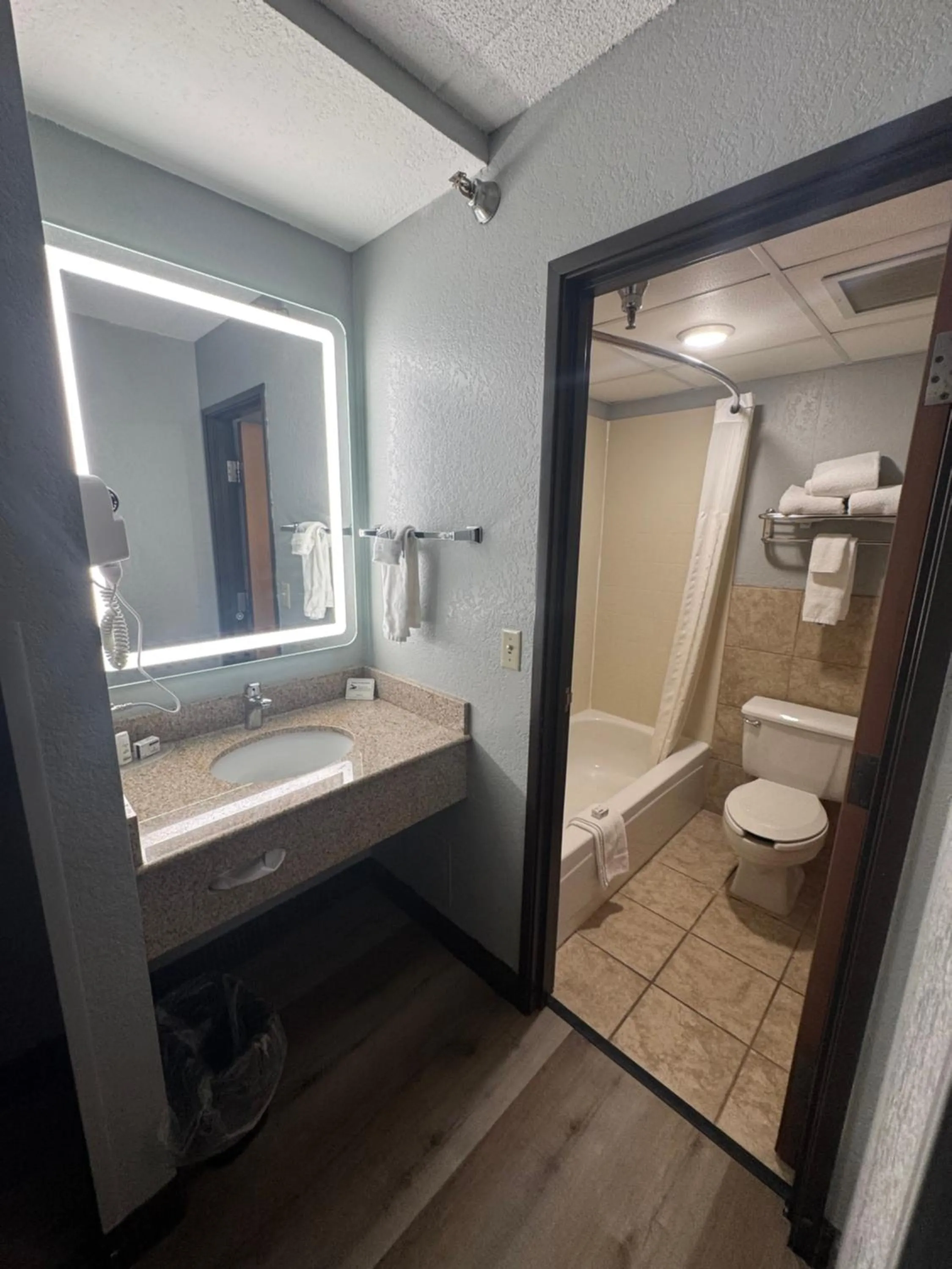 Bathroom in AmericInn by Wyndham Albert Lea