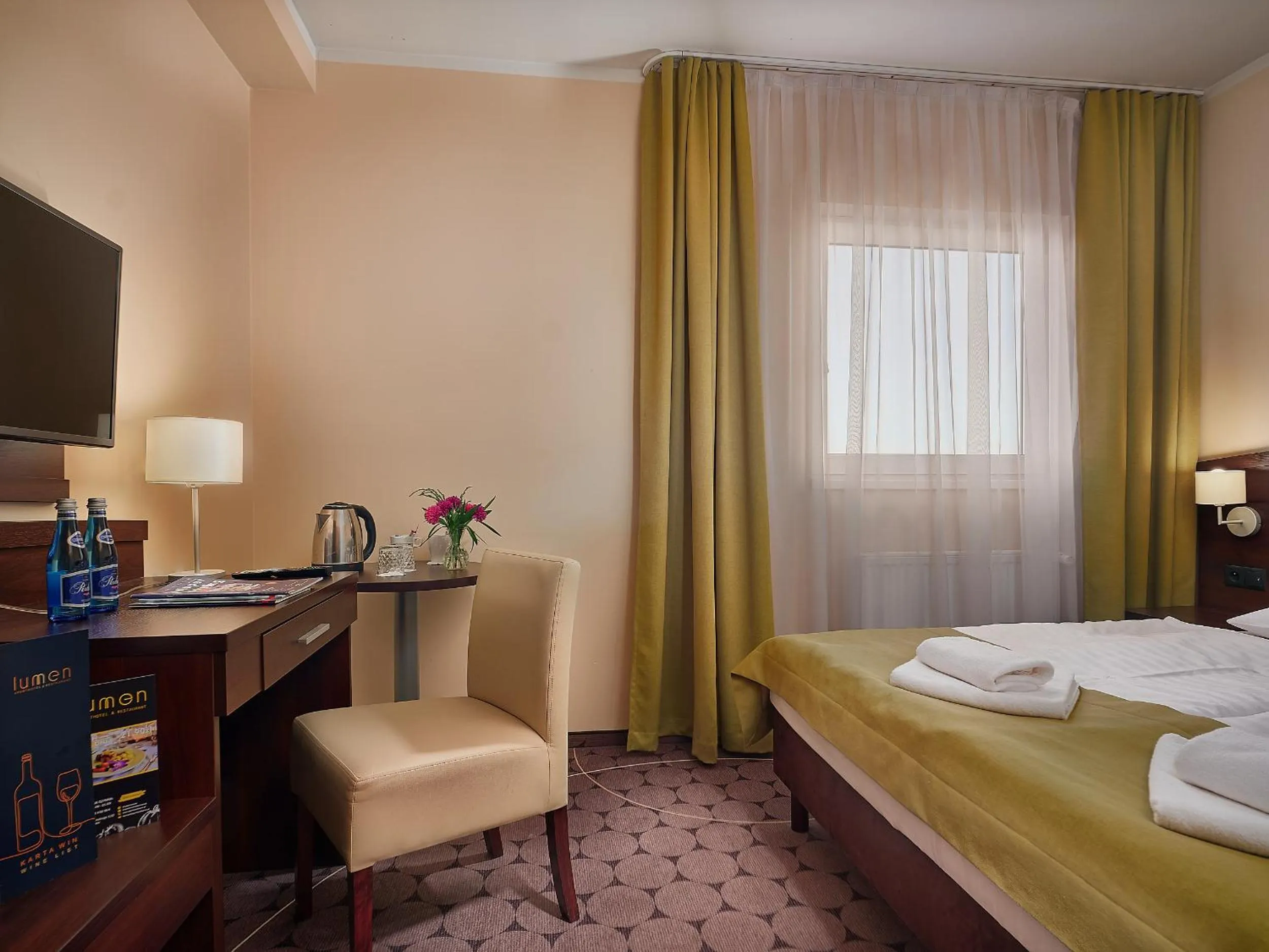 Bed in Aparthotel Lumen