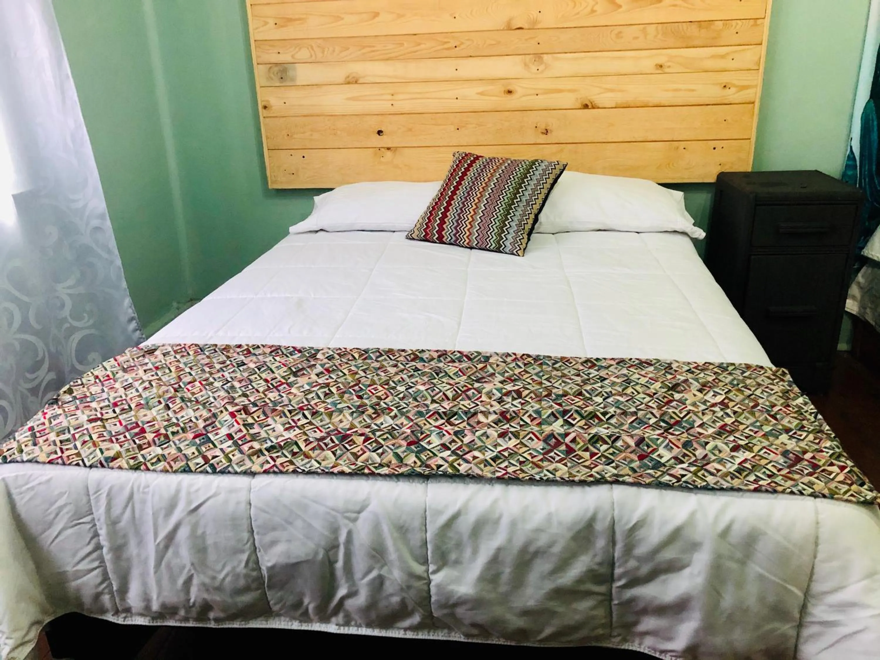 Bed in Hostal Kuira Bá by Rotamundos