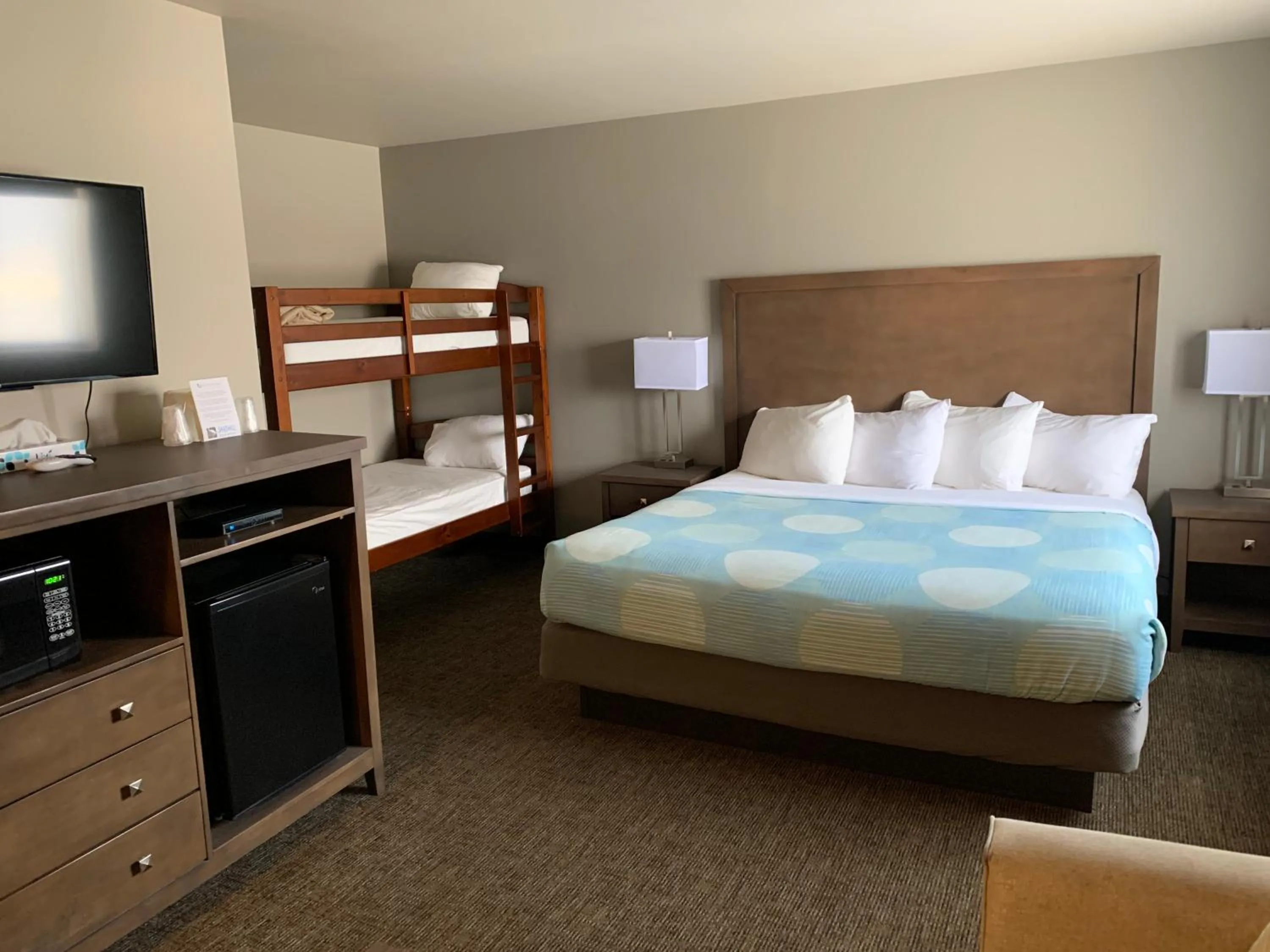 Bed in Sandhill Inn & Suites