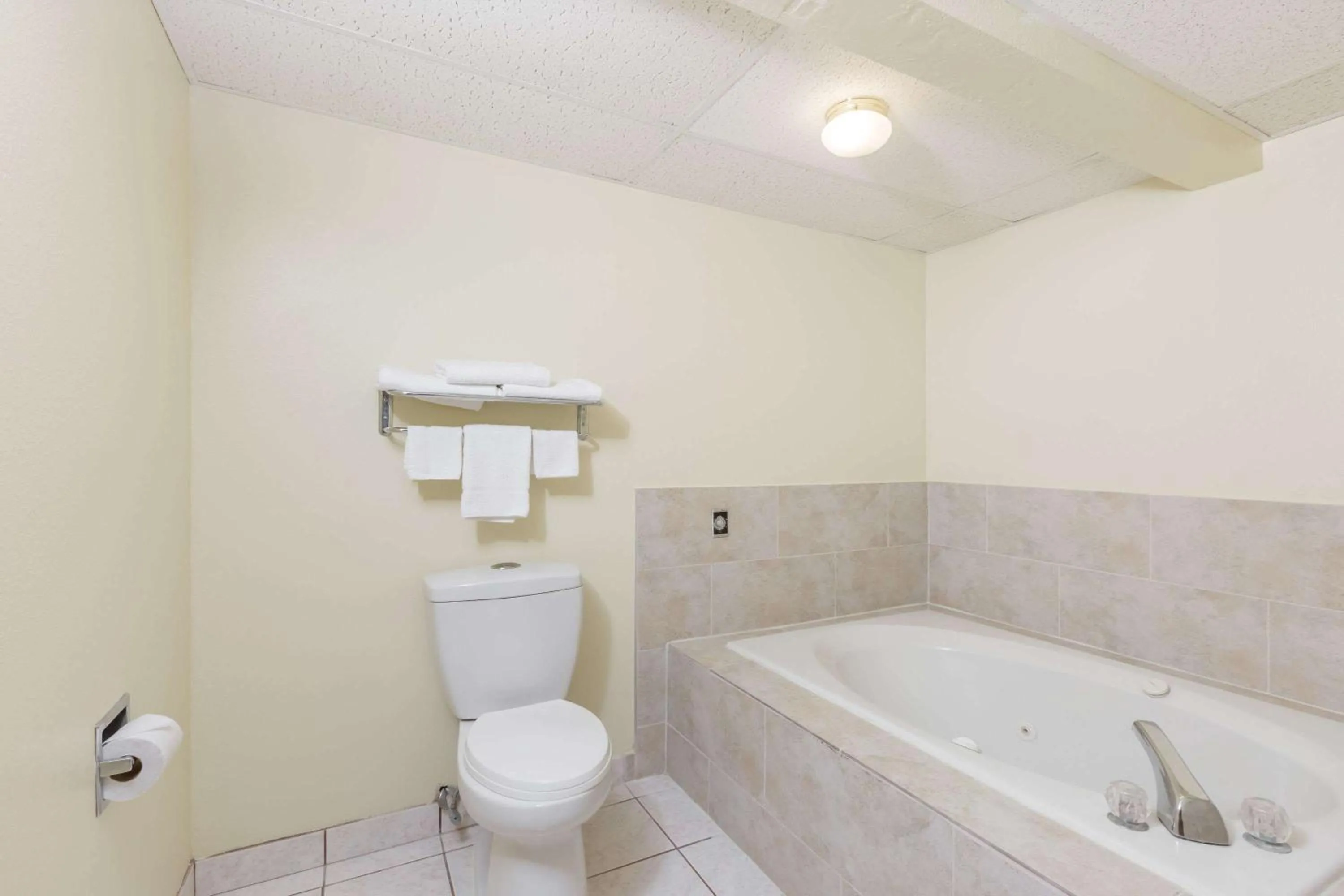 Bathroom in Super 8 by Wyndham Newton