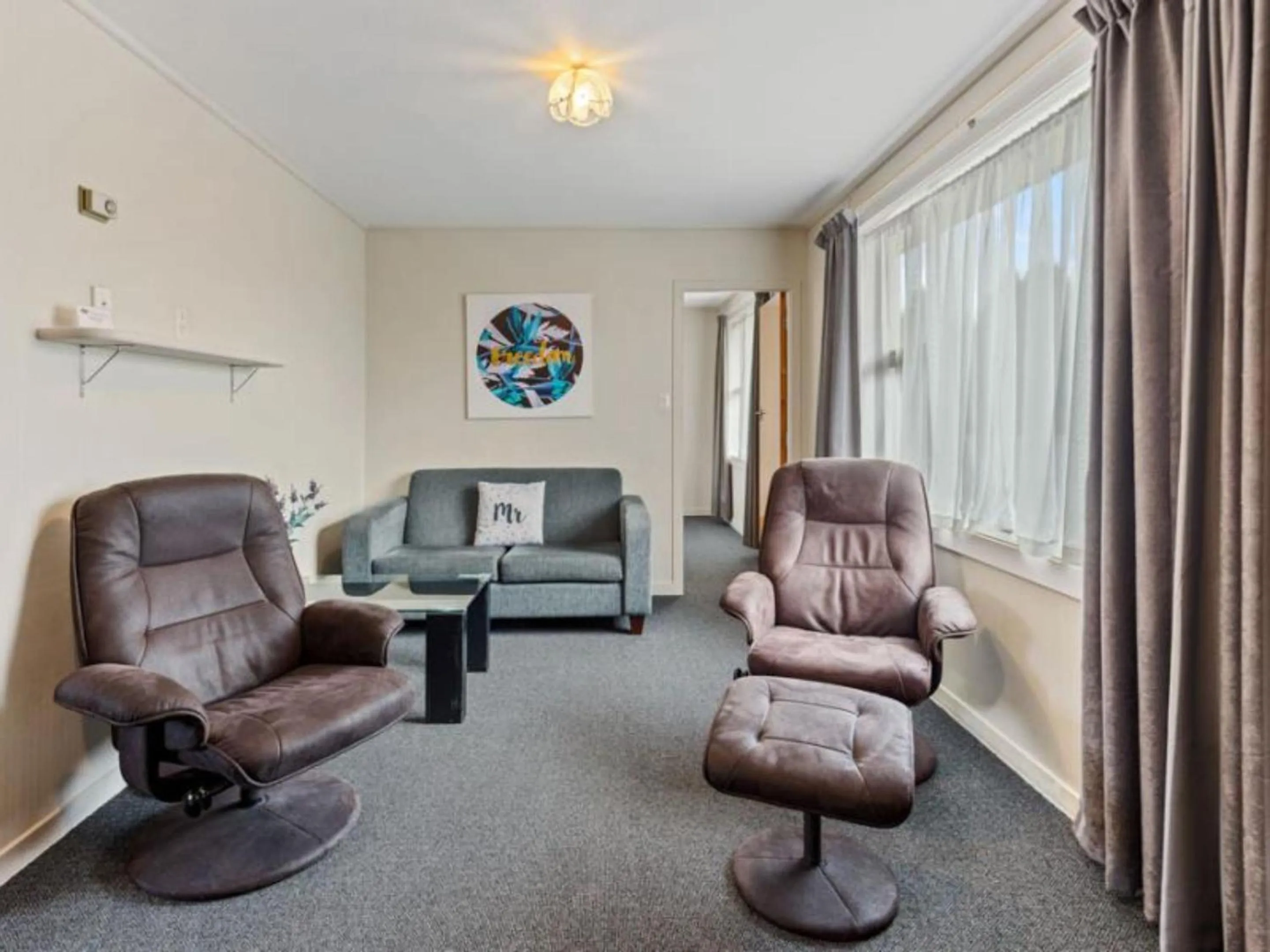 Living room in ASURE Oakleigh Motel