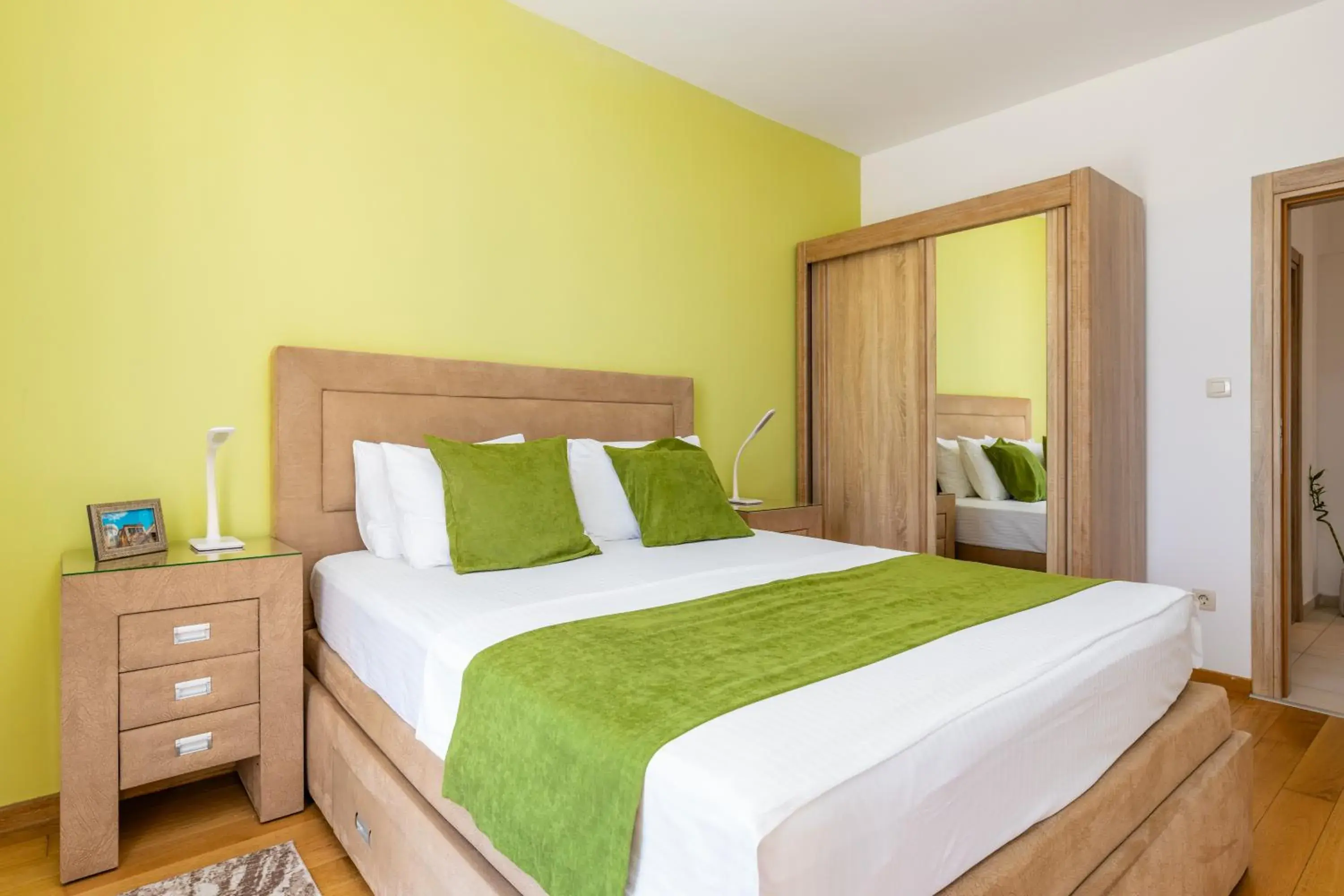 Decorative detail, Bed in Apart hotel M S KATUNJANIN Decorative detail, Bed in Apart hotel M S KATUNJANIN