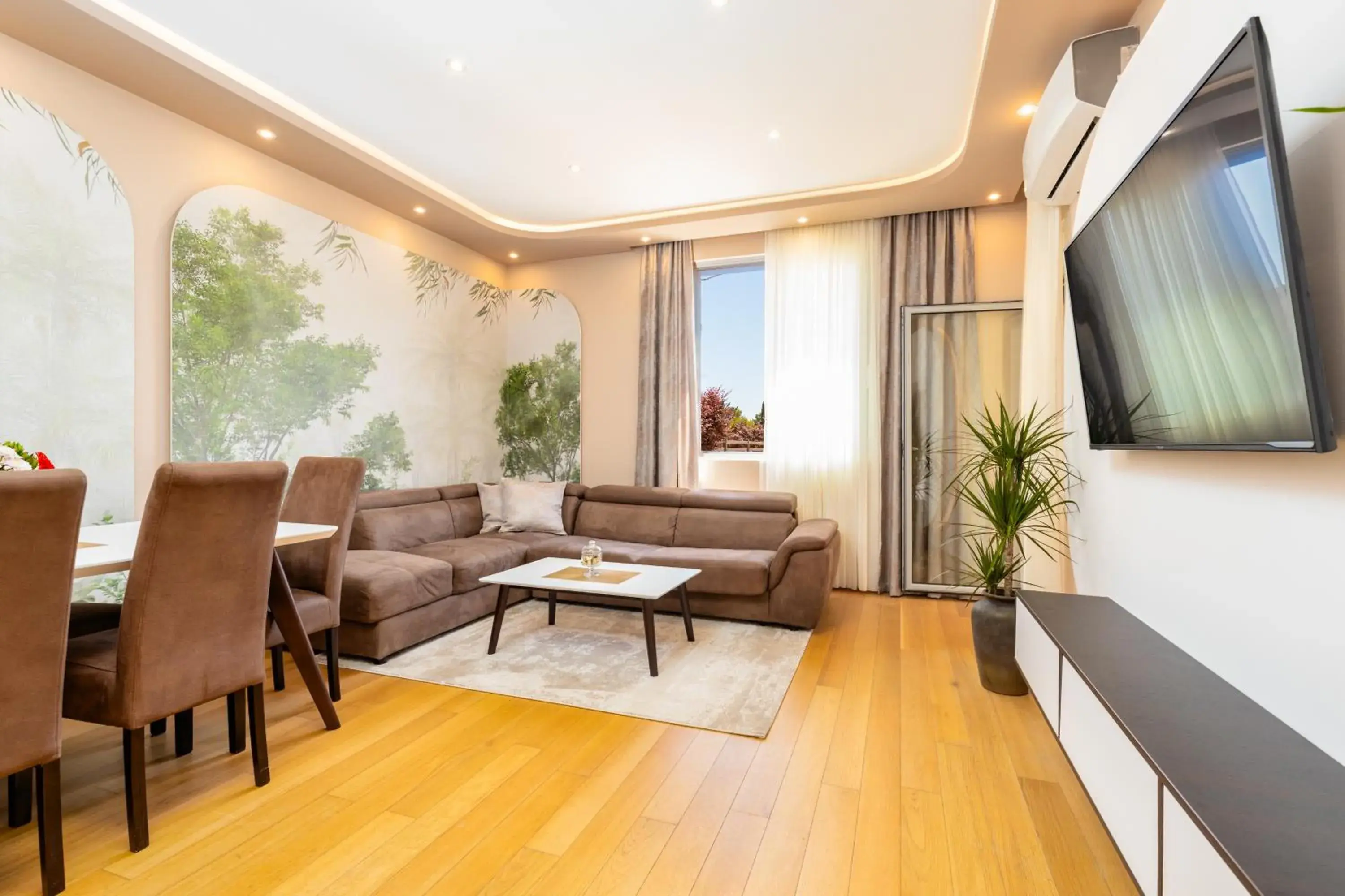 Communal lounge/ TV room in Apart hotel M S KATUNJANIN Communal lounge/ TV room in Apart hotel M S KATUNJANIN