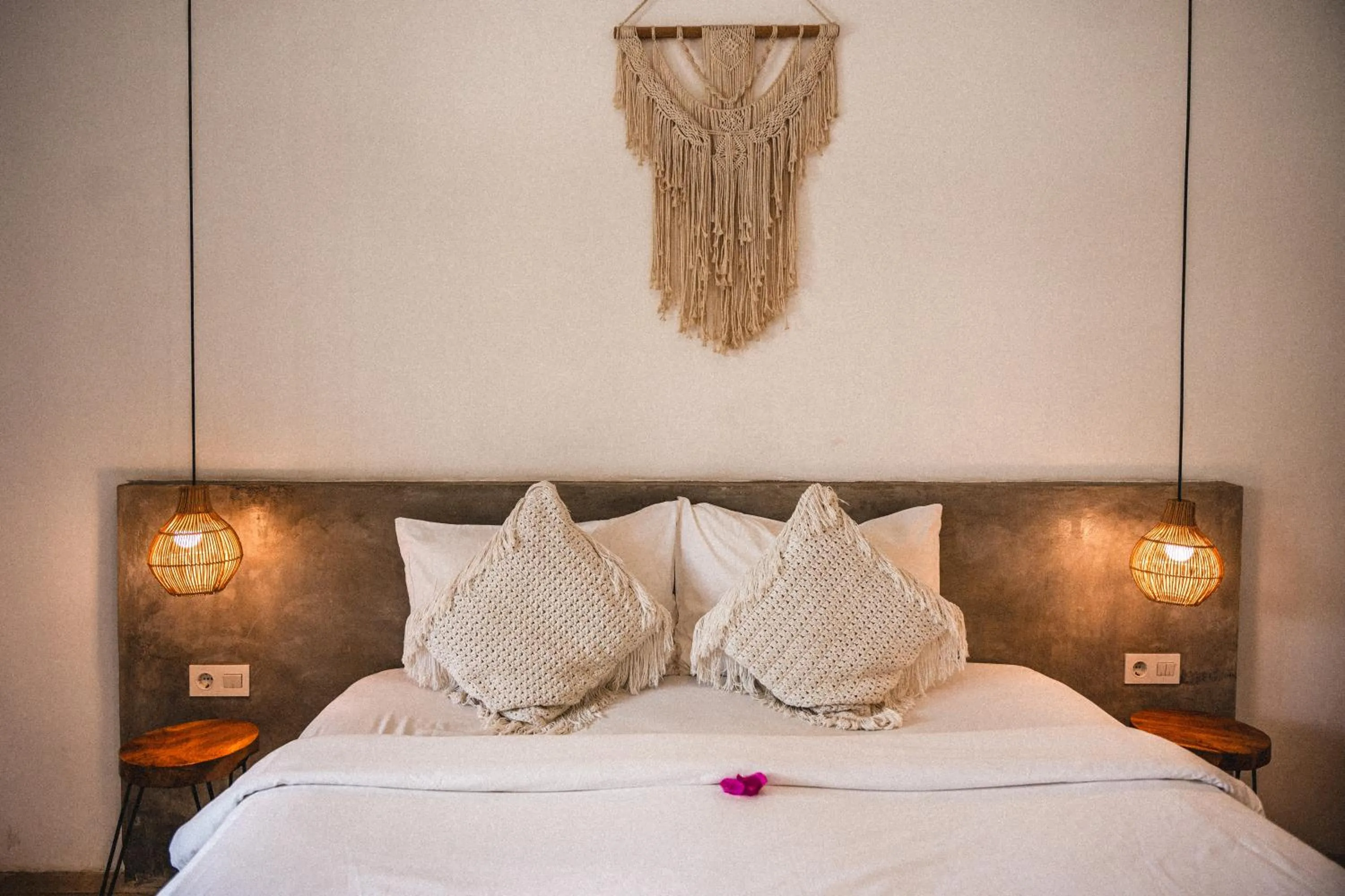 Bed in Suku Lifestyle Hotel & Villas