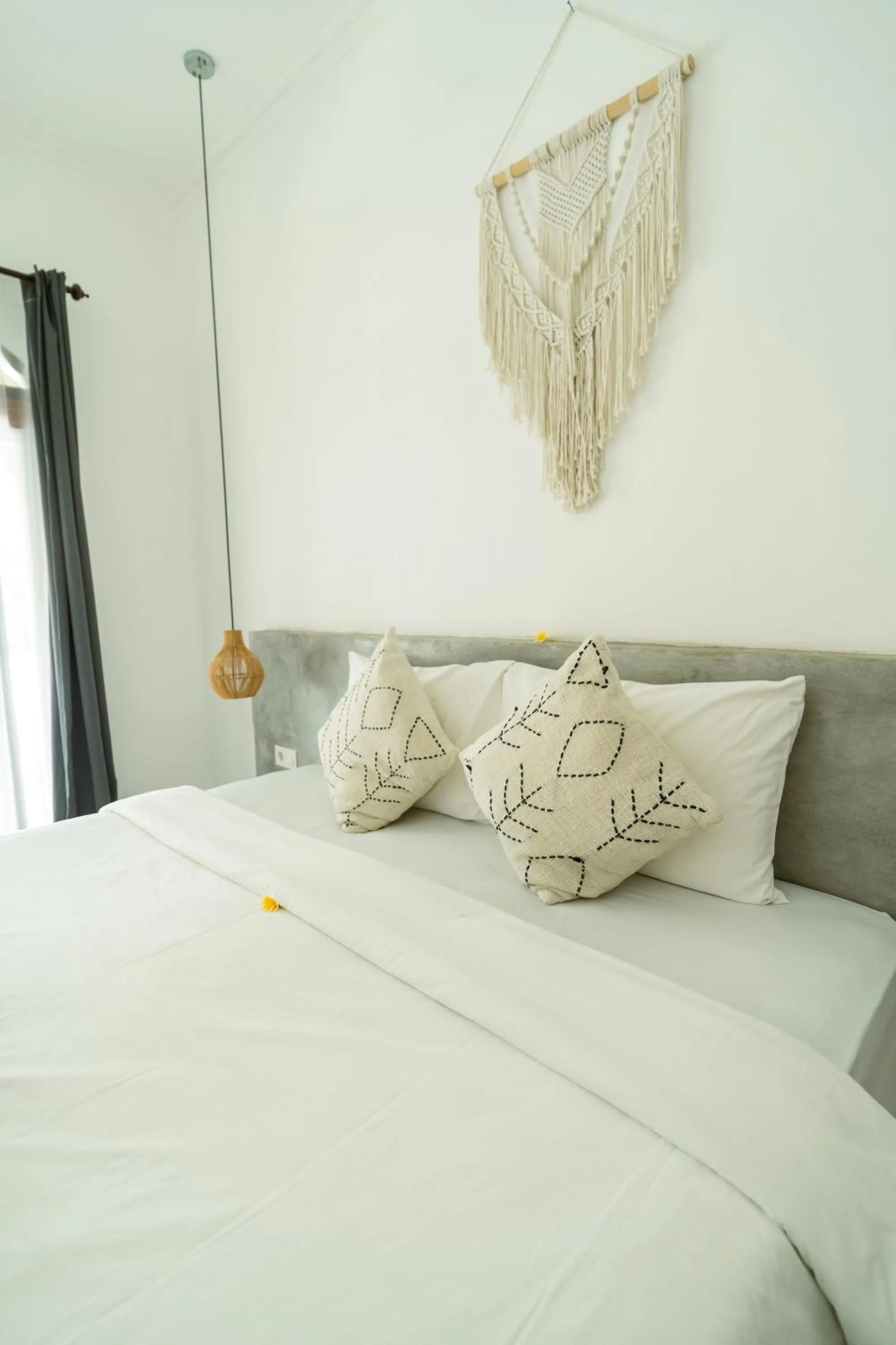 Bed in Suku Lifestyle Hotel & Villas