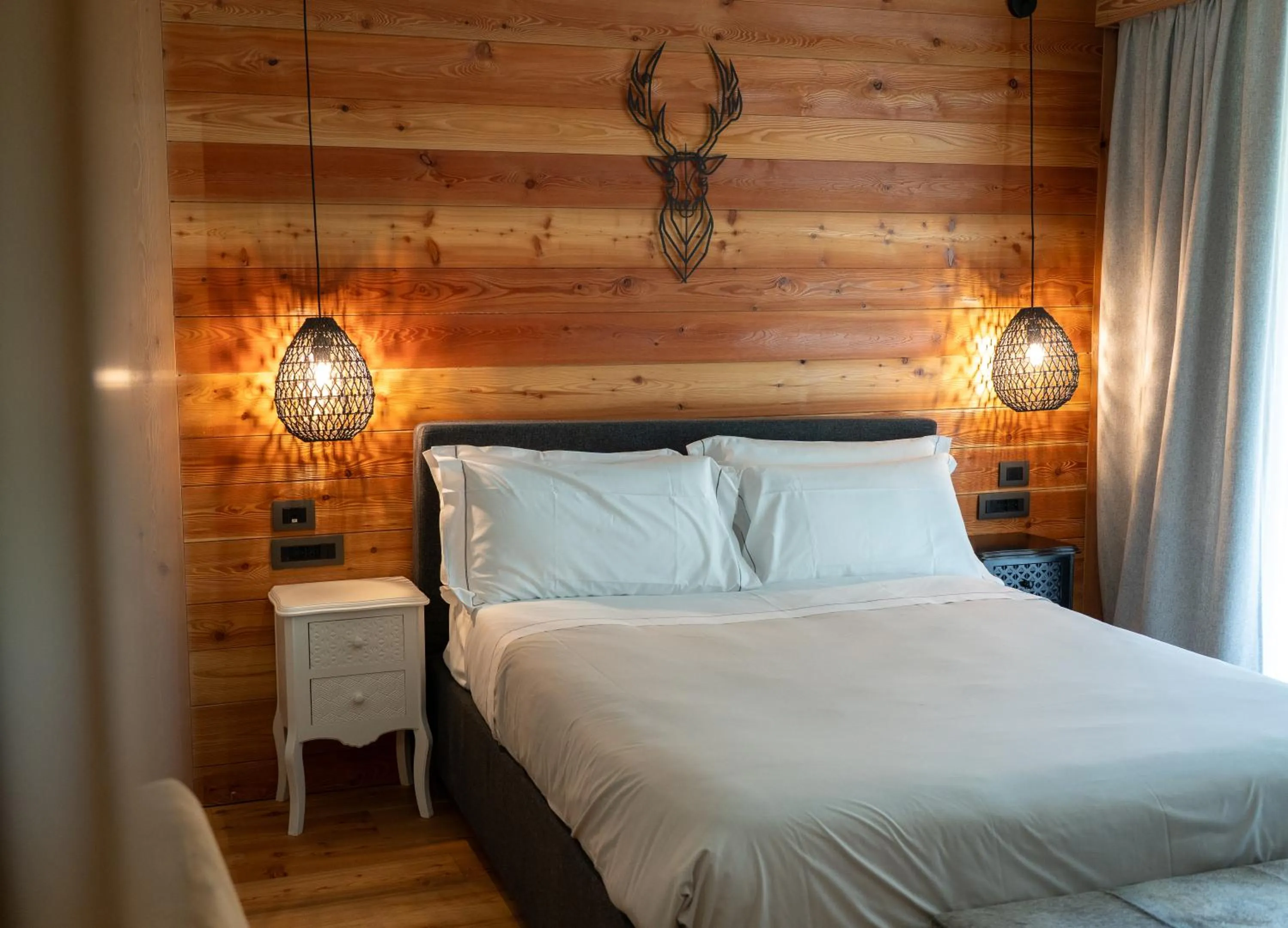 Bed in Au Charmant Petit Lac - Ecohotel Parc & Spa