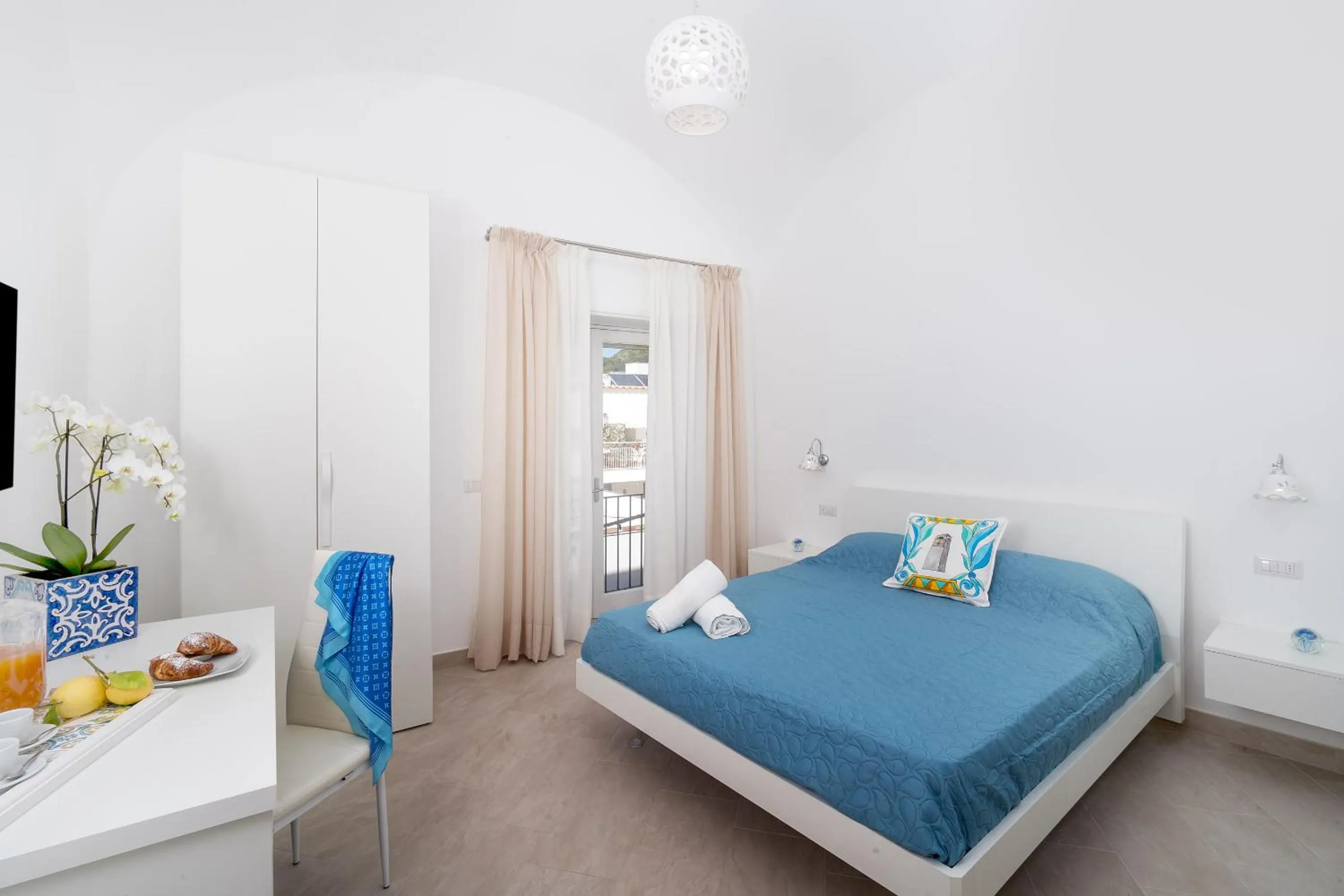 Bed in Caprita Guest House