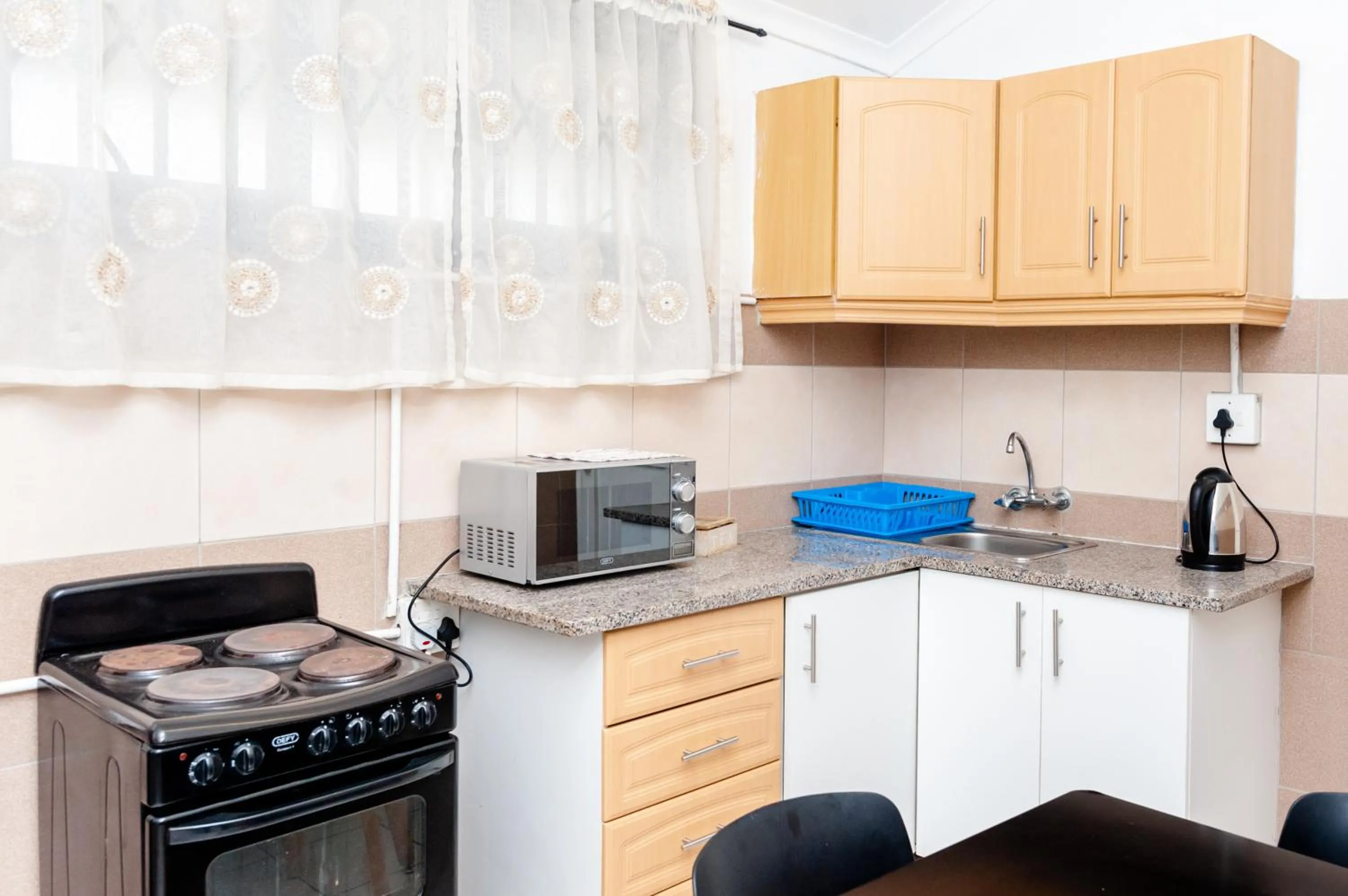 Kitchen or kitchenette in Nkosazana Guest House