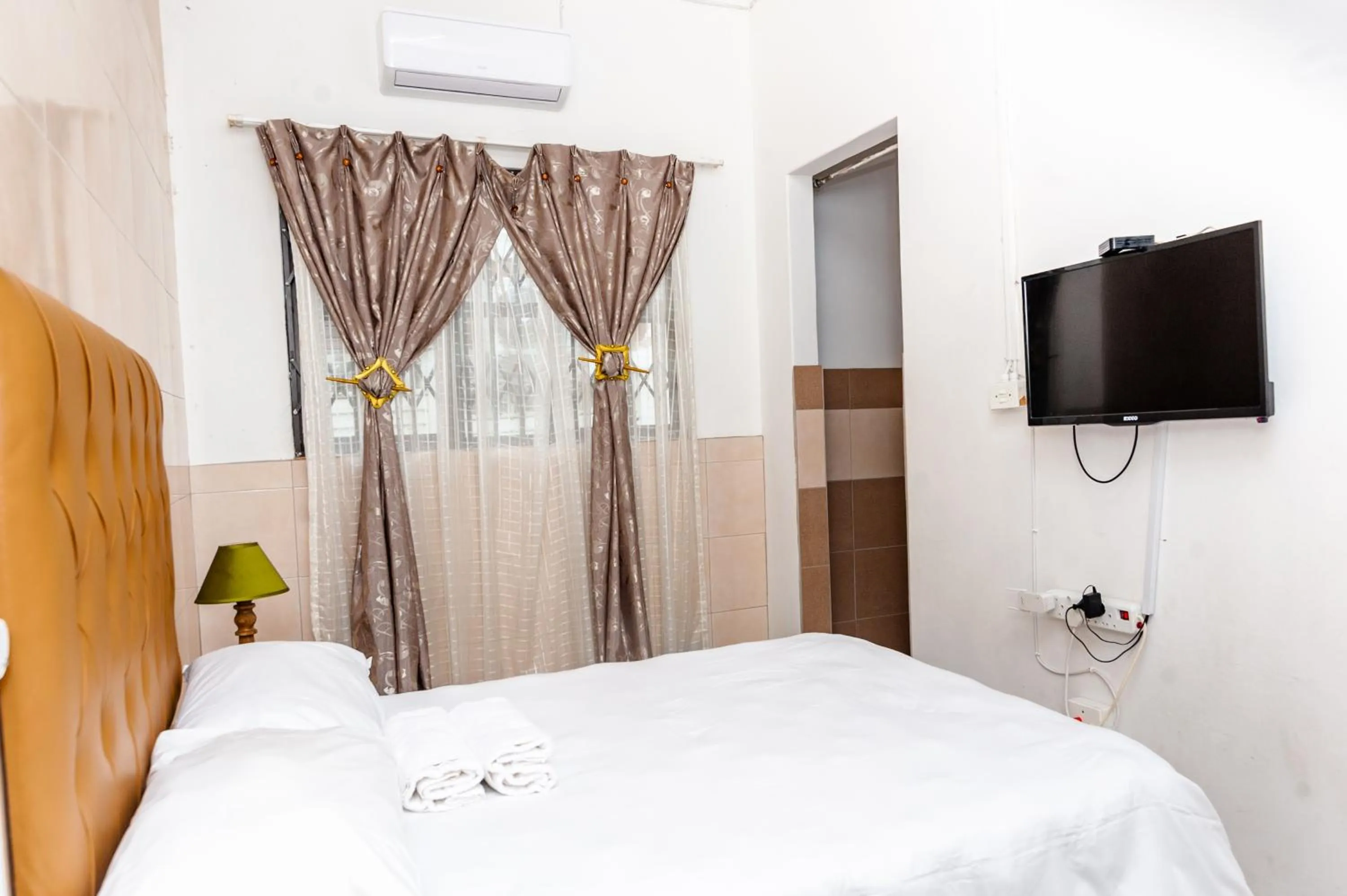 TV and multimedia, Bed in Nkosazana Guest House