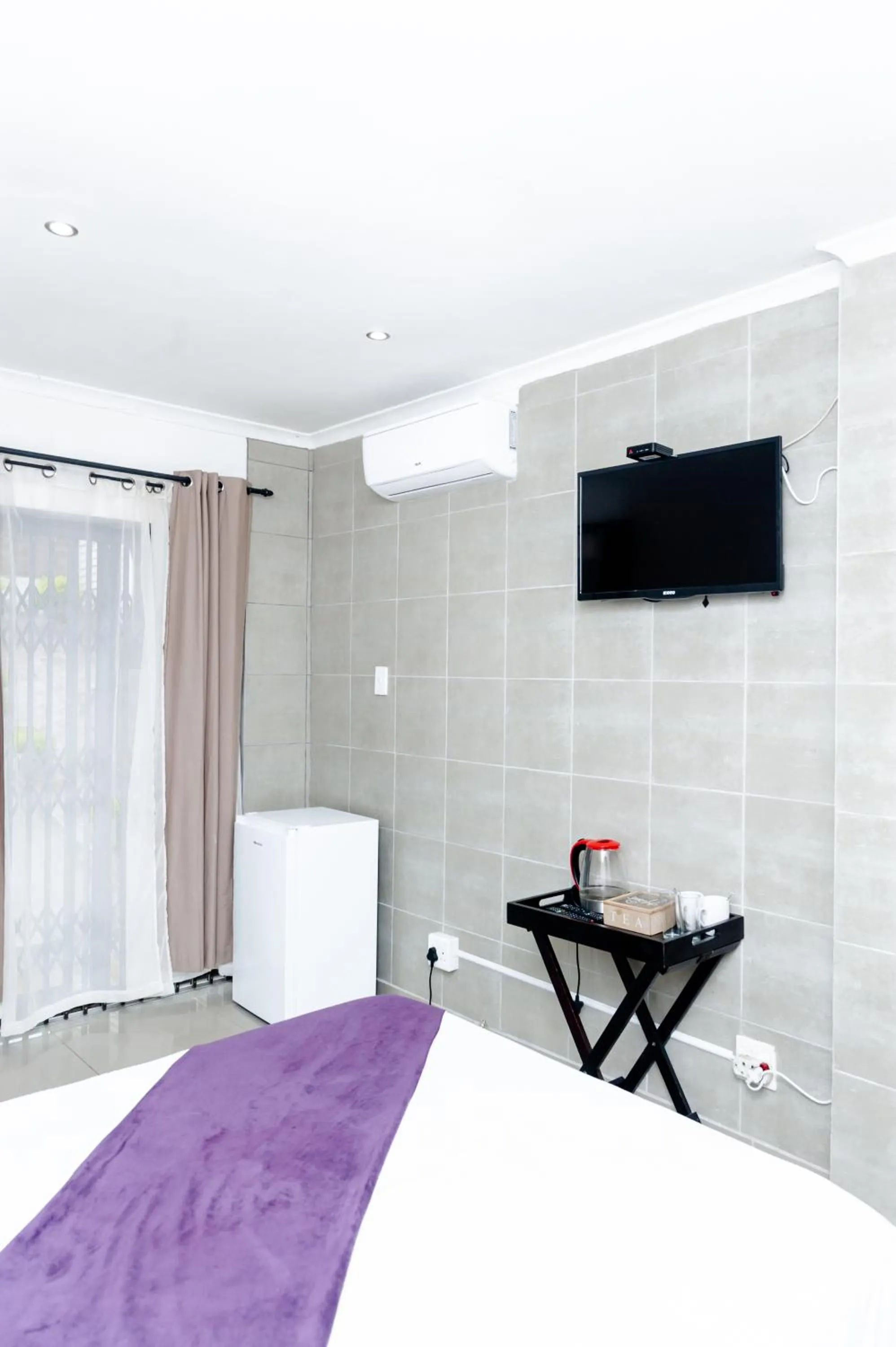 TV and multimedia, Bed in Nkosazana Guest House