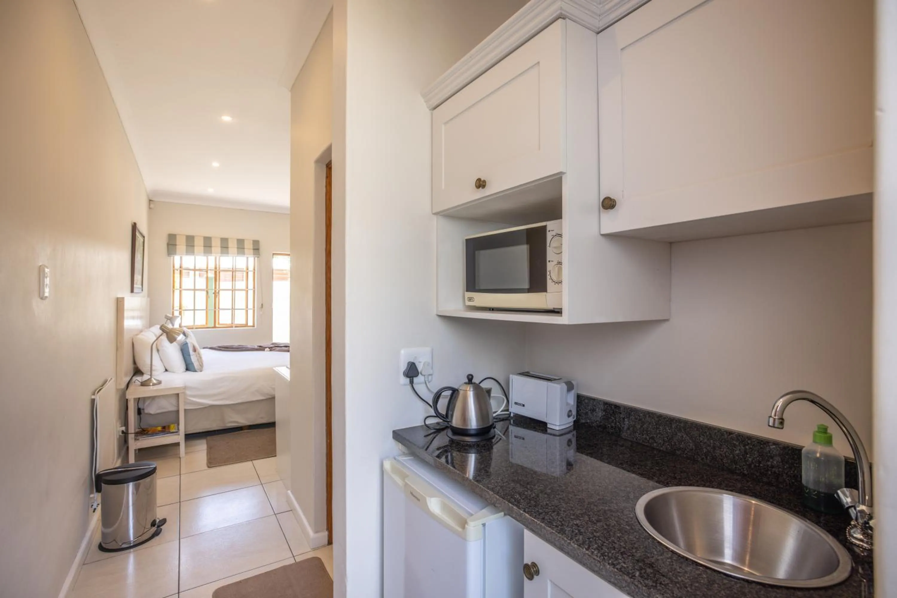 Kitchen or kitchenette, Bed in Lanherne Guest House Bed & Breakfast