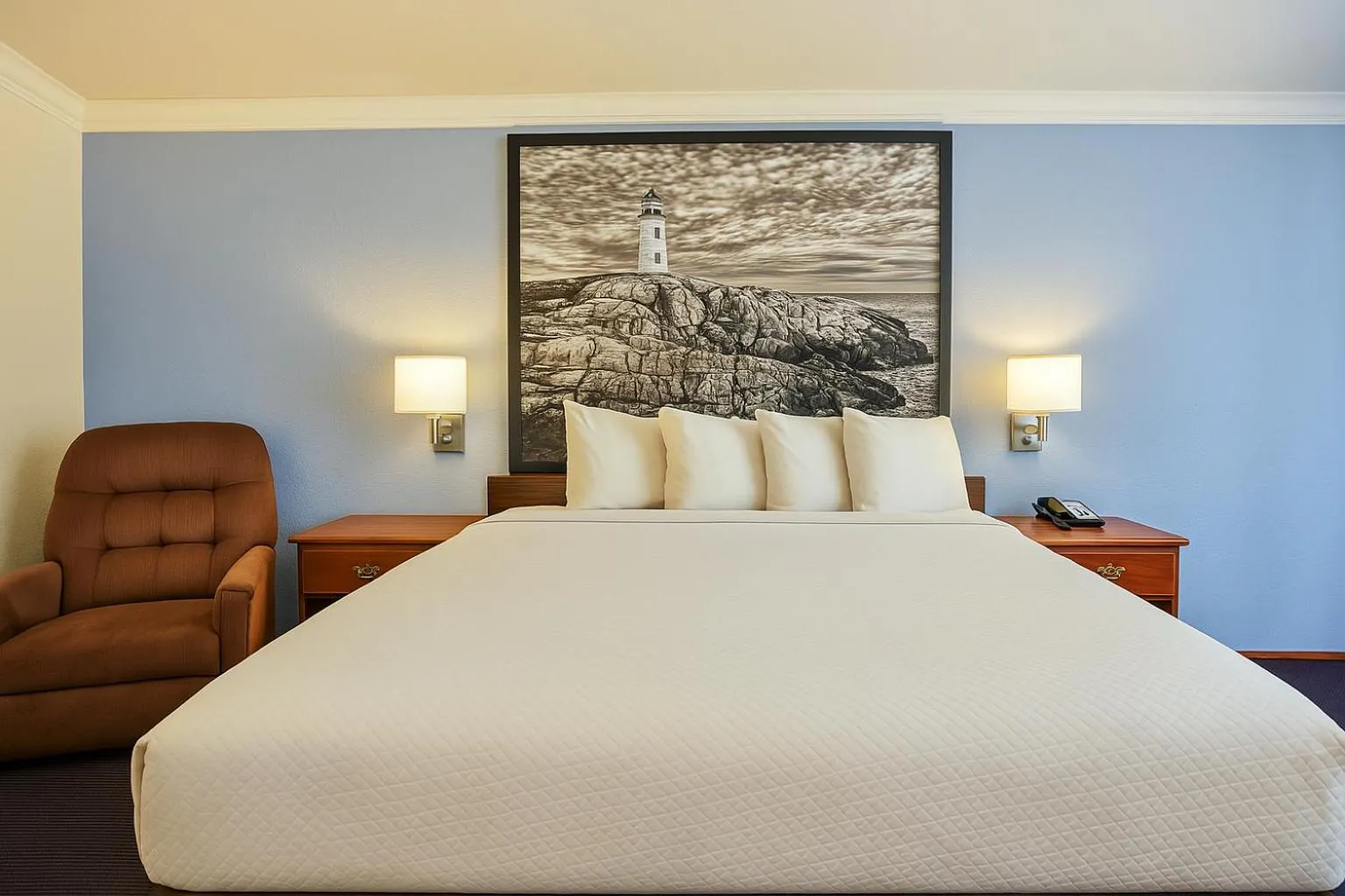 Bed in Creekside Inn & Suites