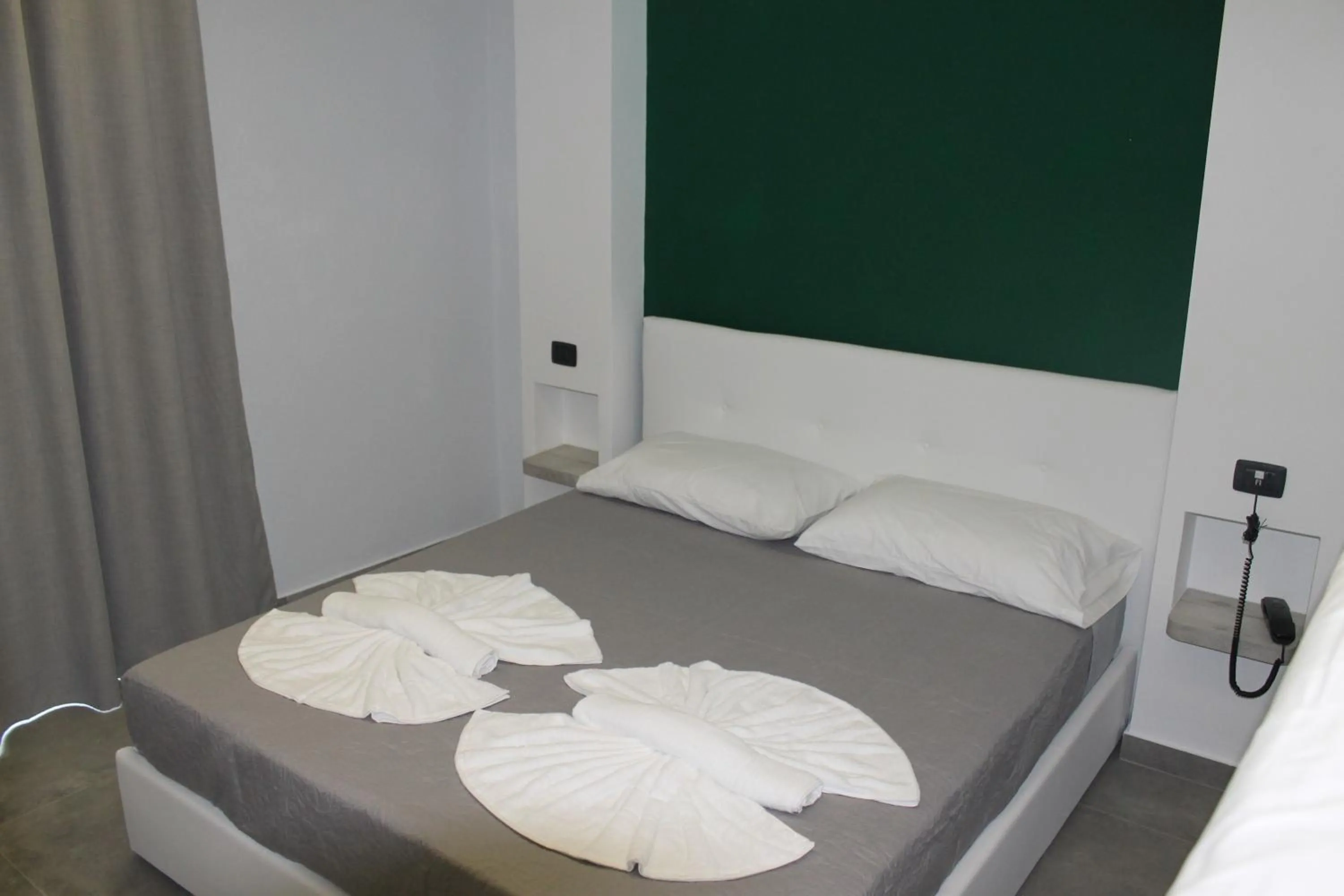 Bed in Olive Luxury Rooms