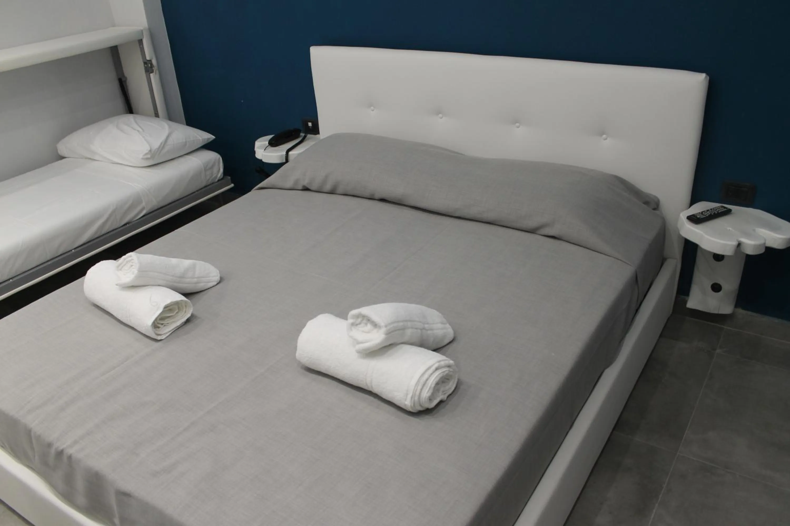 Bed in Olive Luxury Rooms