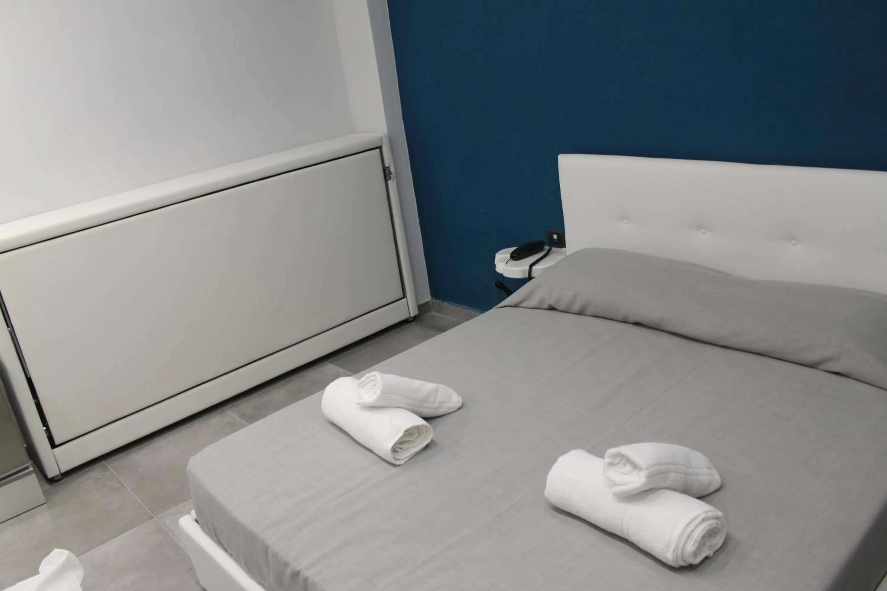 Bed in Olive Luxury Rooms