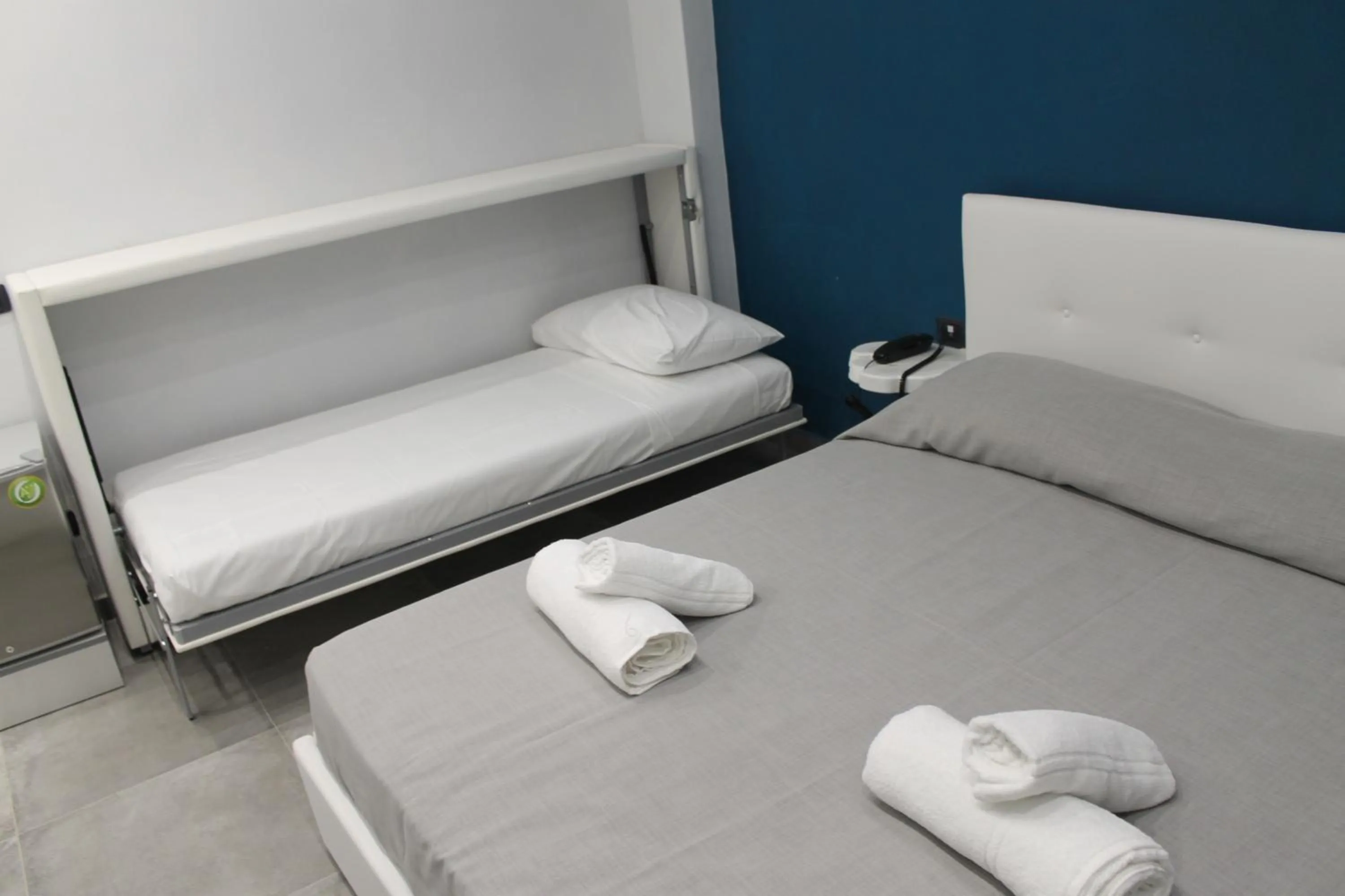 Bed in Olive Luxury Rooms