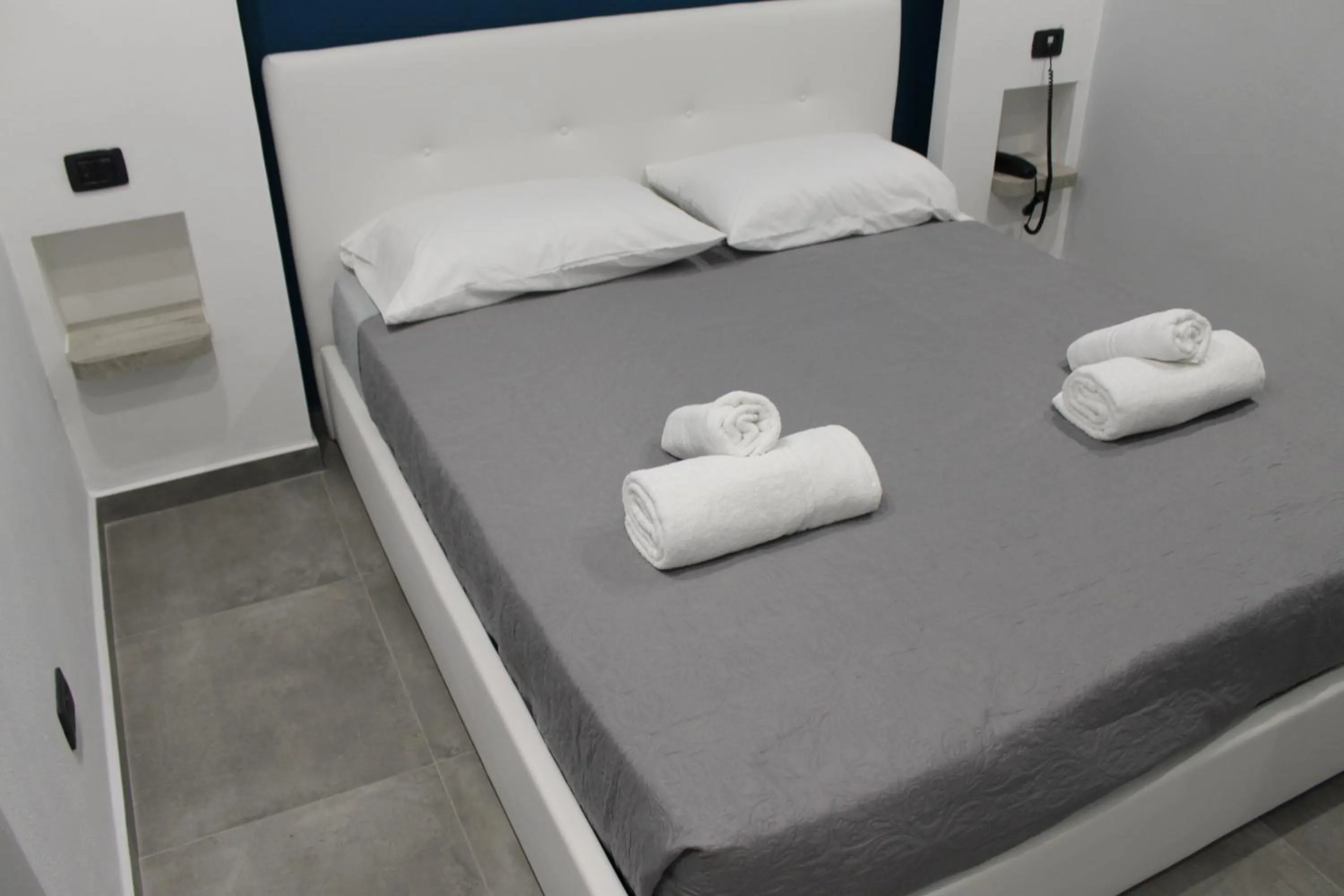 Bed in Olive Luxury Rooms