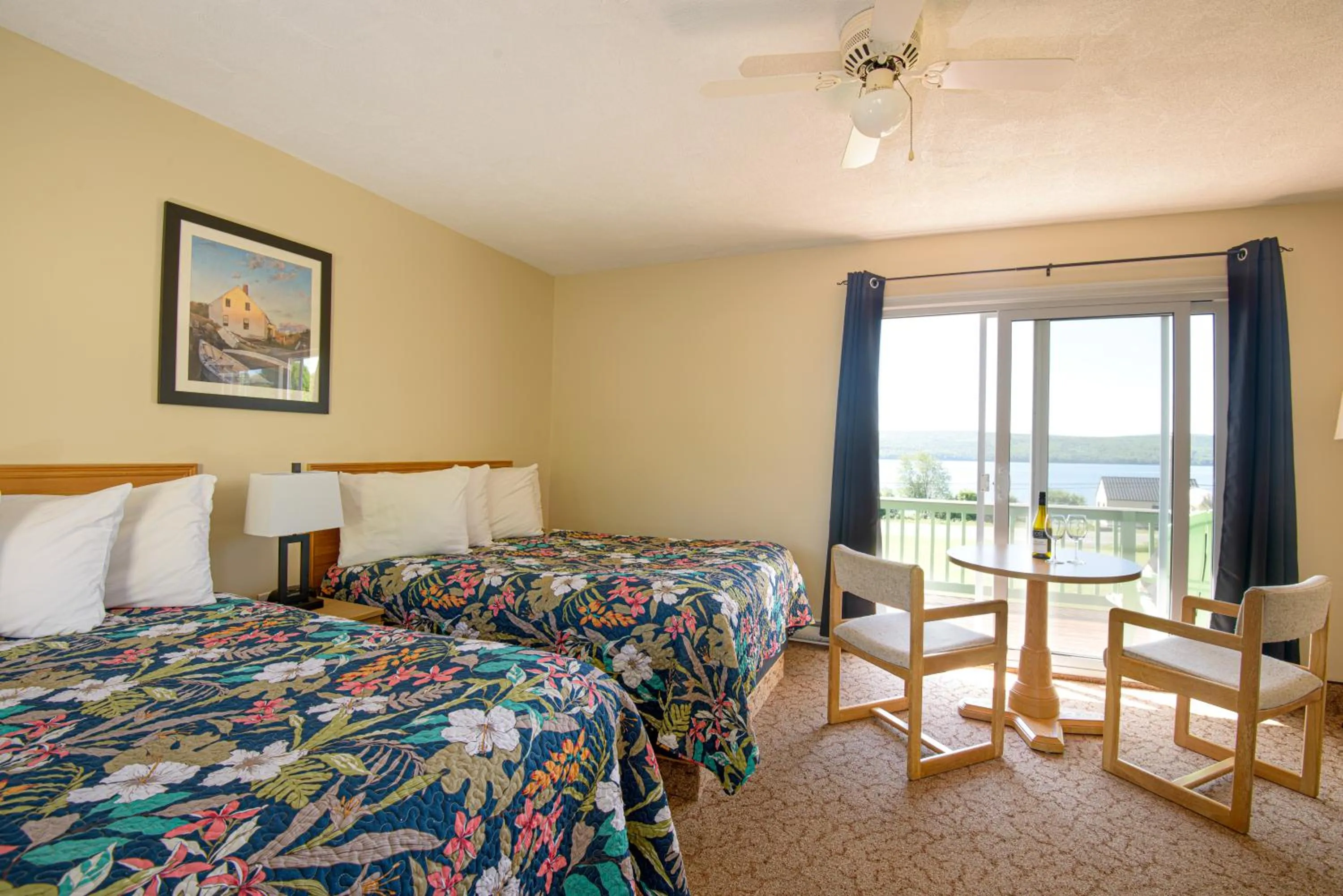 Bed in Cabot Trail Motel