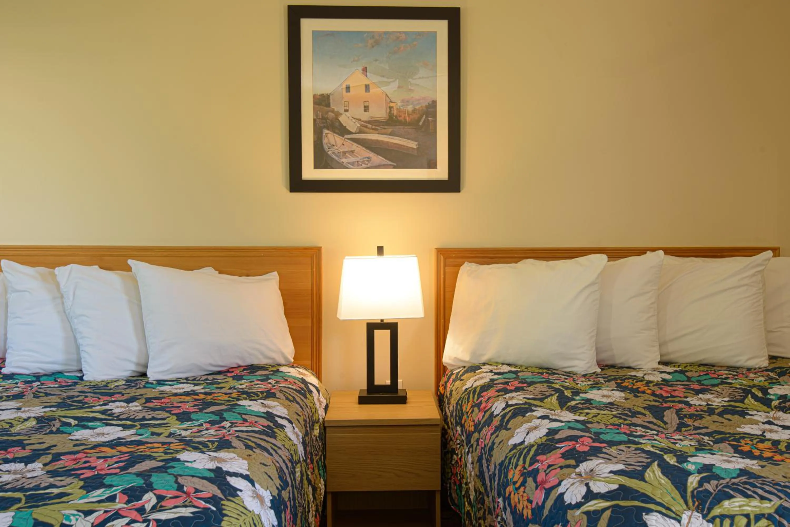 Bed in Cabot Trail Motel