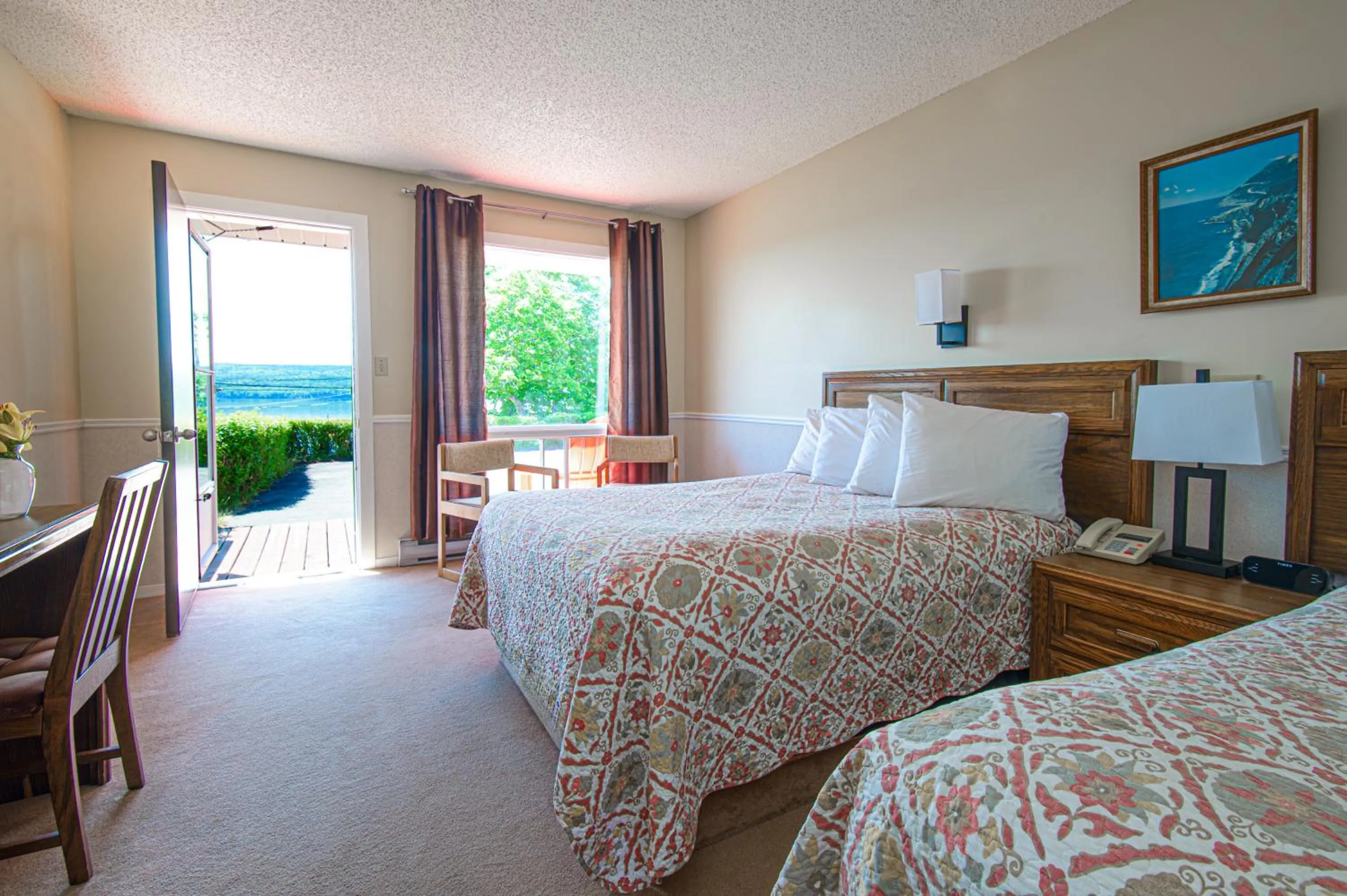 Bed in Cabot Trail Motel