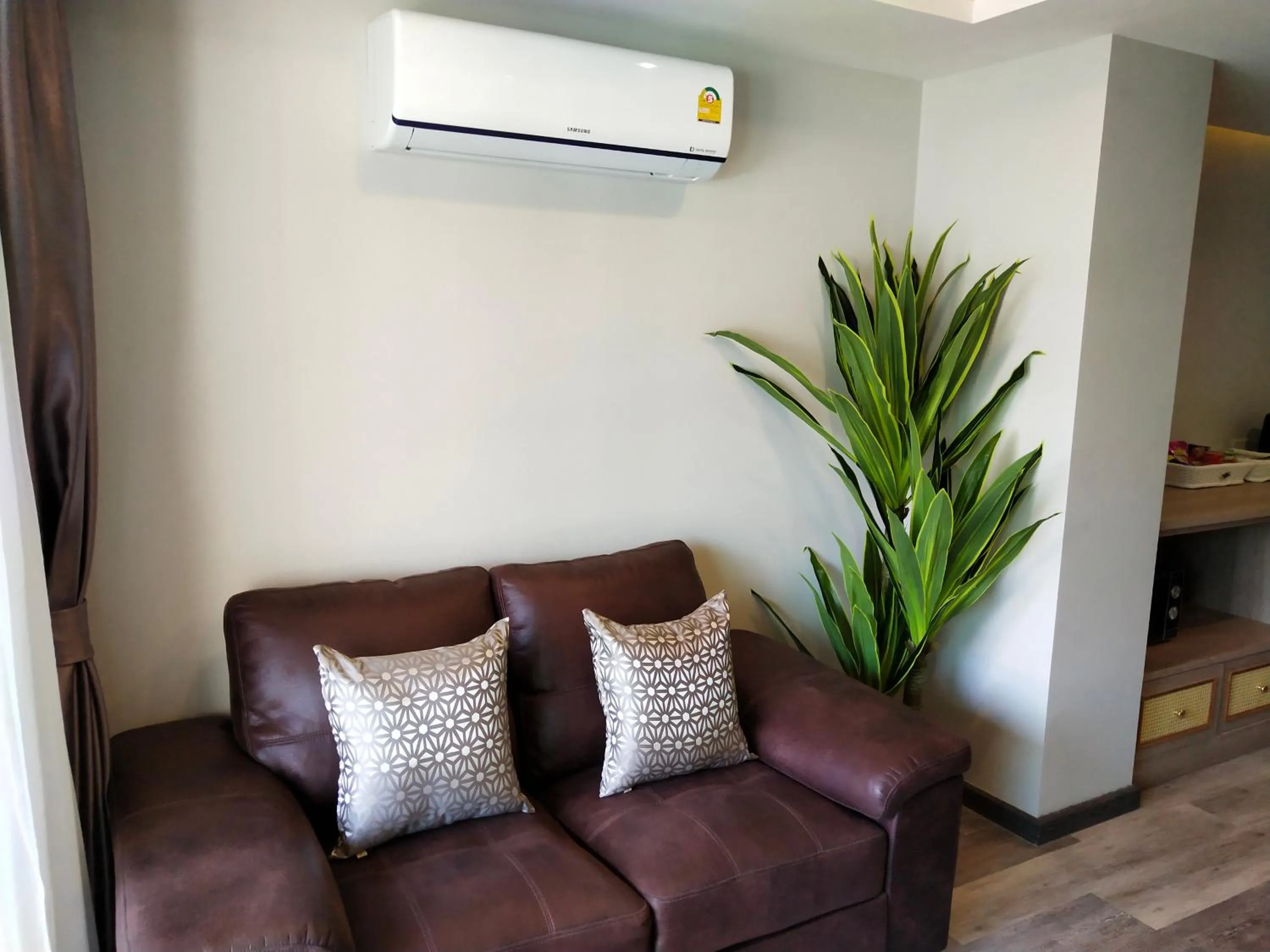 Living room in Hotel De Sripoom