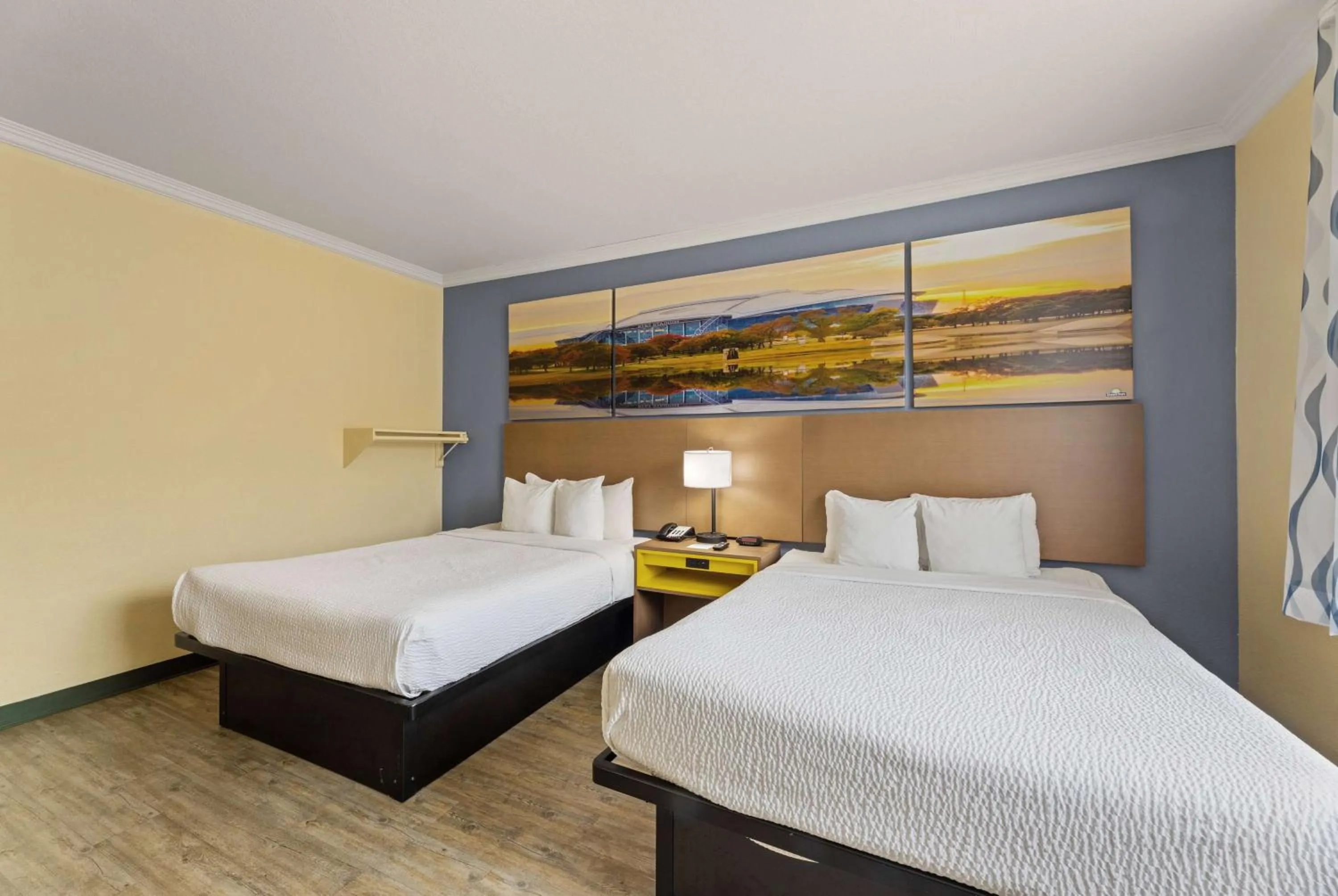 Photo of the whole room, Bed in Days Inn & Suites by Wyndham DFW Airport South-Euless