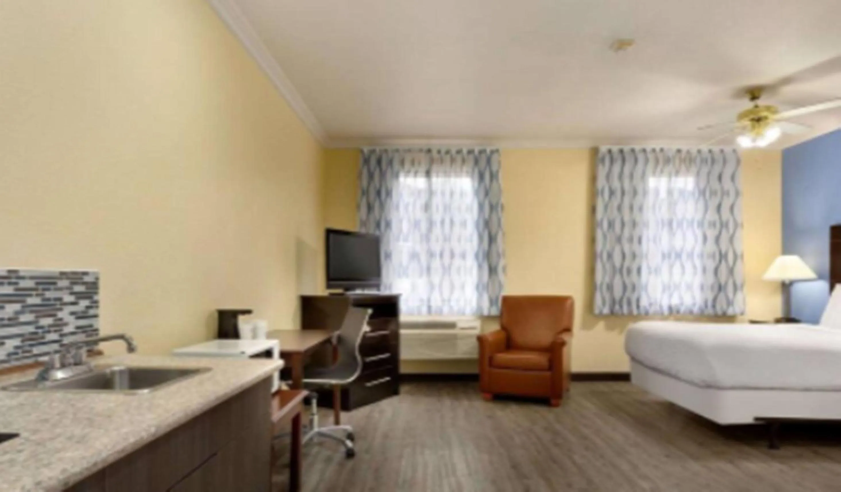 Seating area in Days Inn & Suites by Wyndham DFW Airport South-Euless