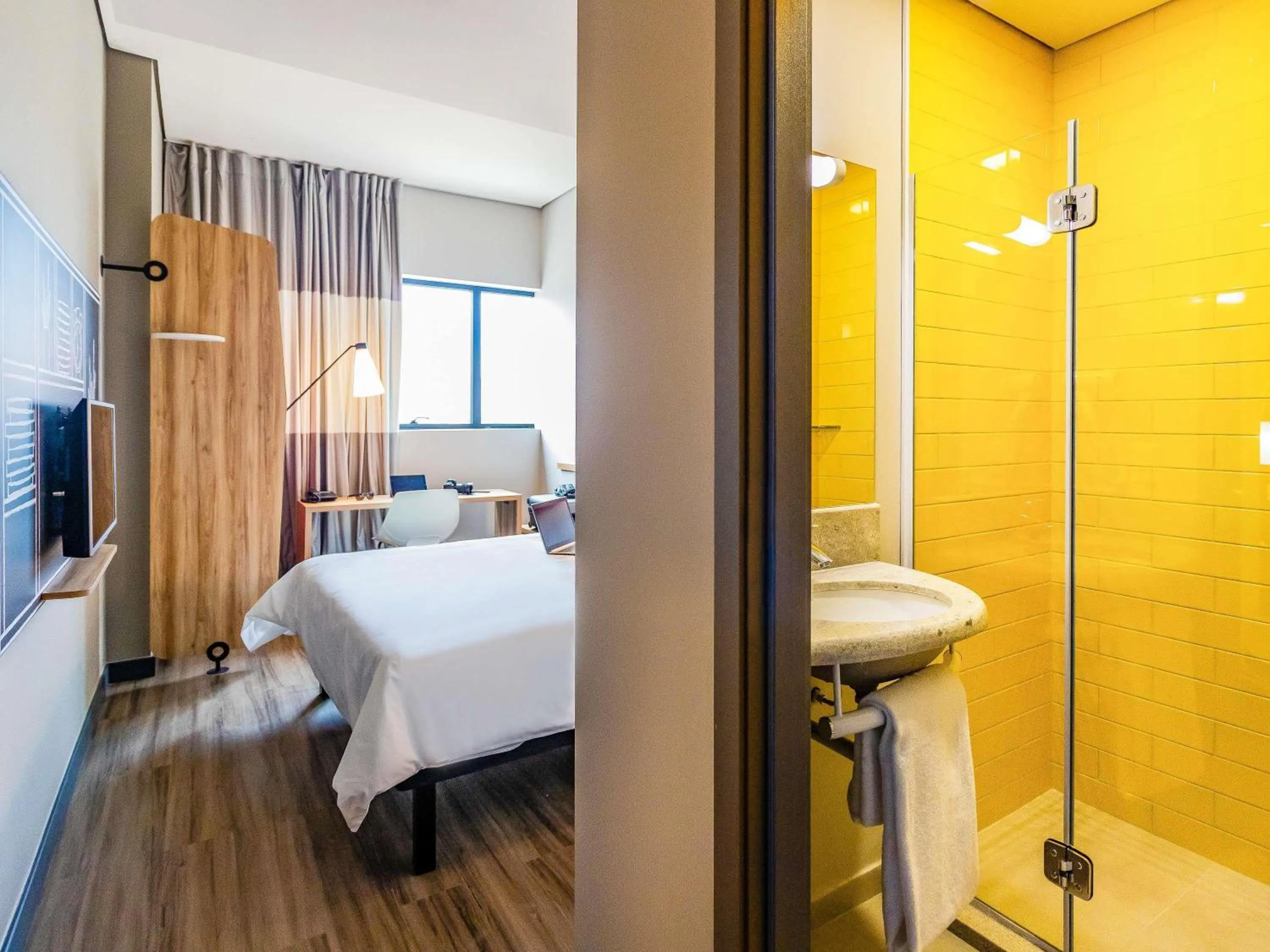 Bedroom, Bed in ibis Palmas Avenida JK