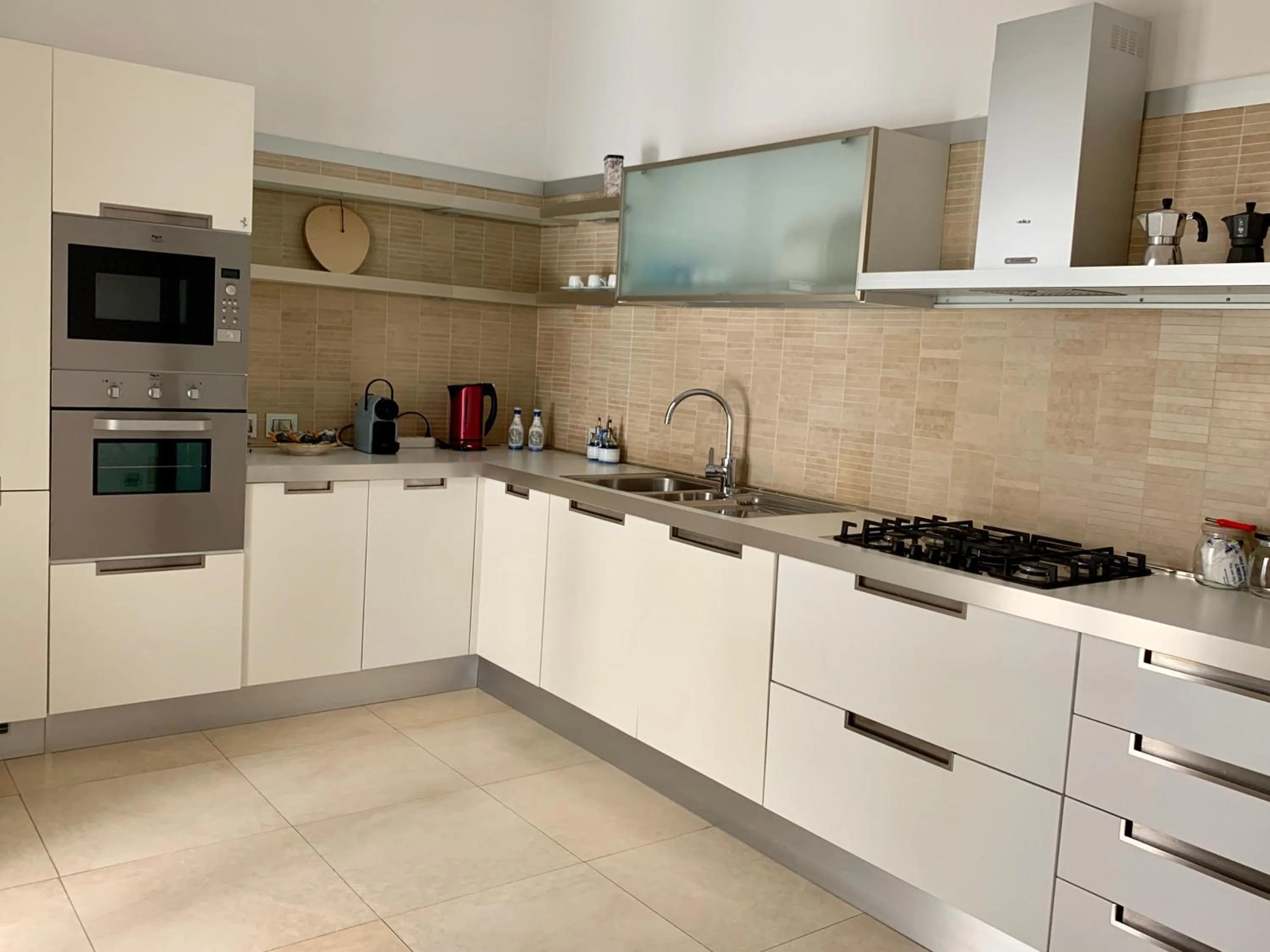 Kitchen or kitchenette in Searooms - Stanze a Mare