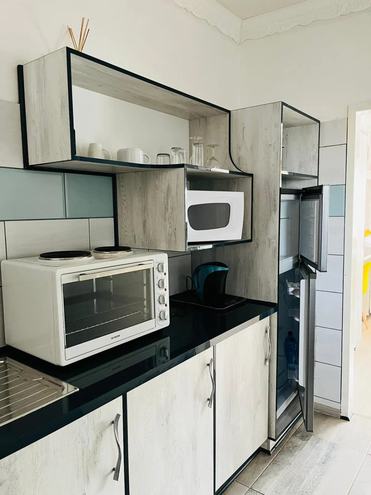 Kitchen or kitchenette in Abecor Hotel