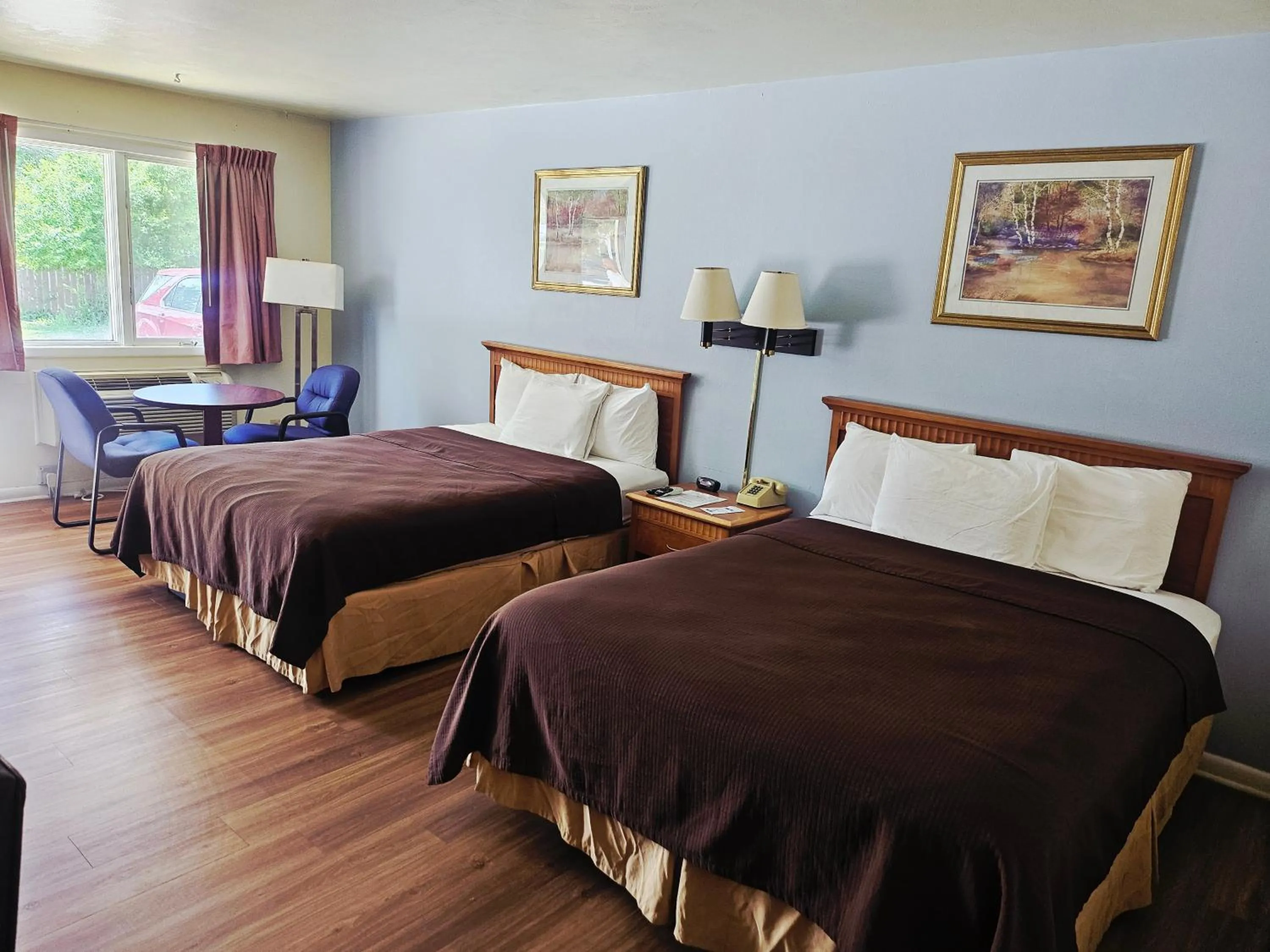 Bed in The Budget Inn Express