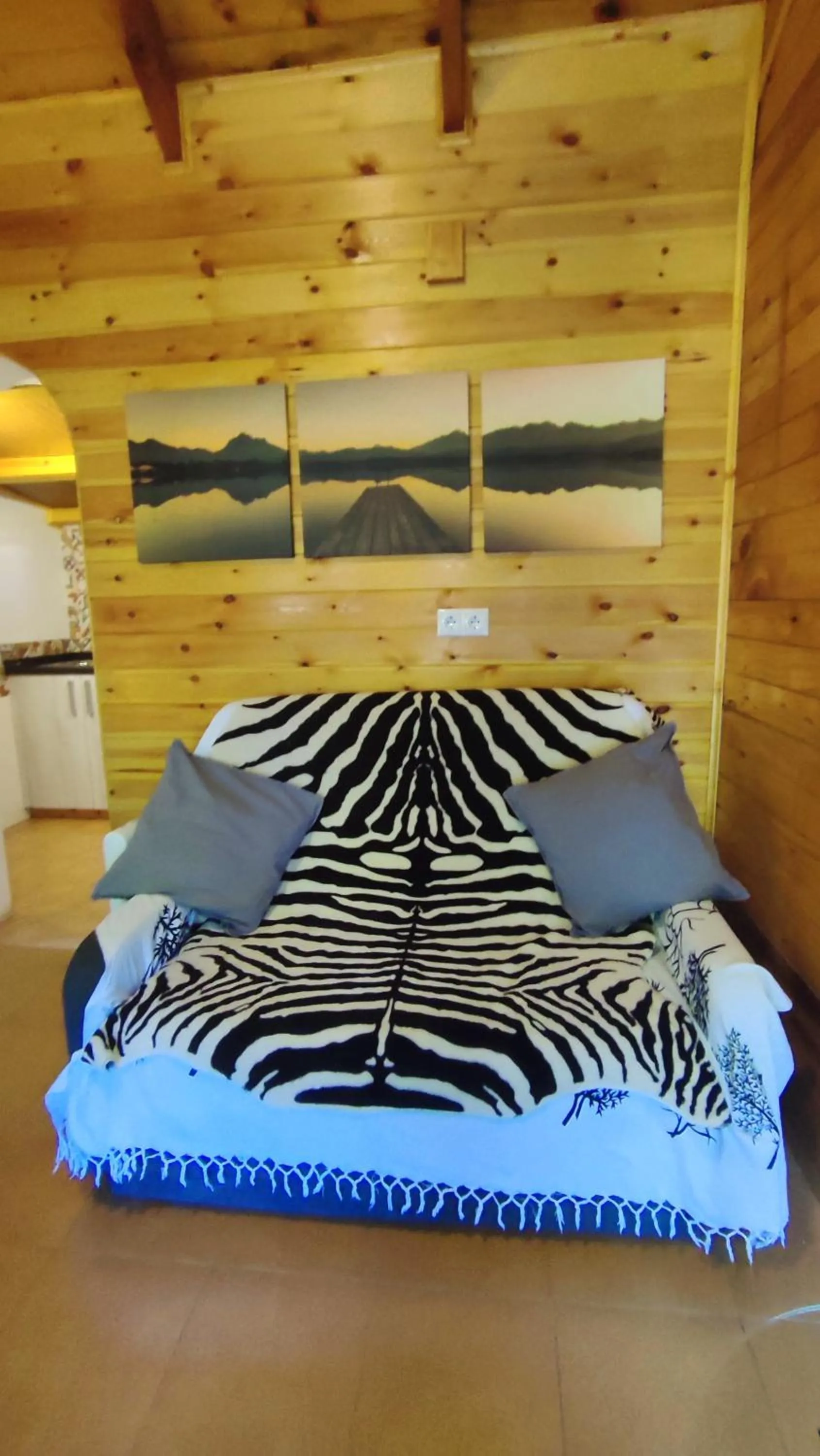 Bed in La cabaña del lago en ZAFIRO LAGUNAZO Parque Natural del Río Mundo