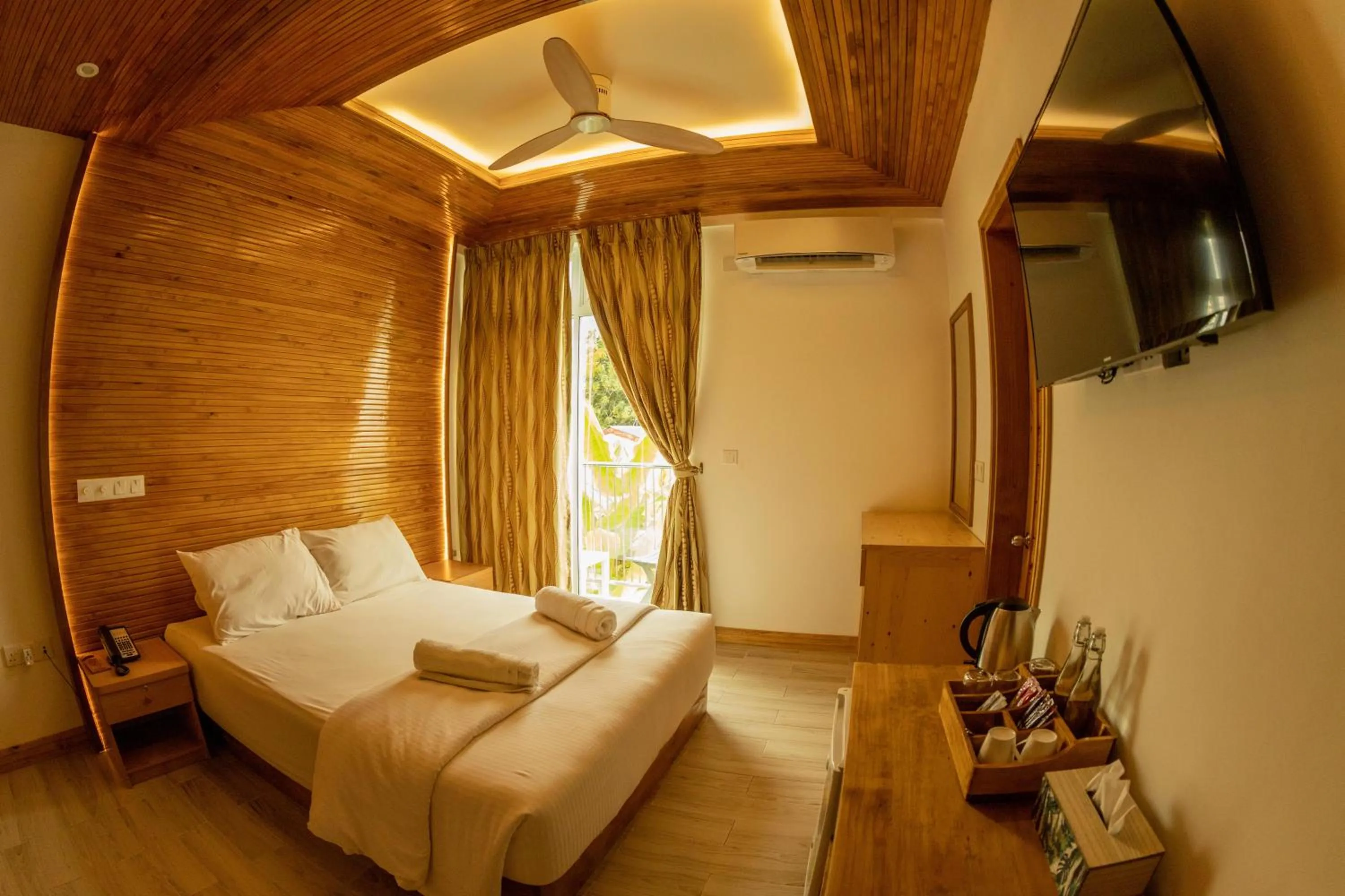 Photo of the whole room, Bed in PERLA Dhangethi