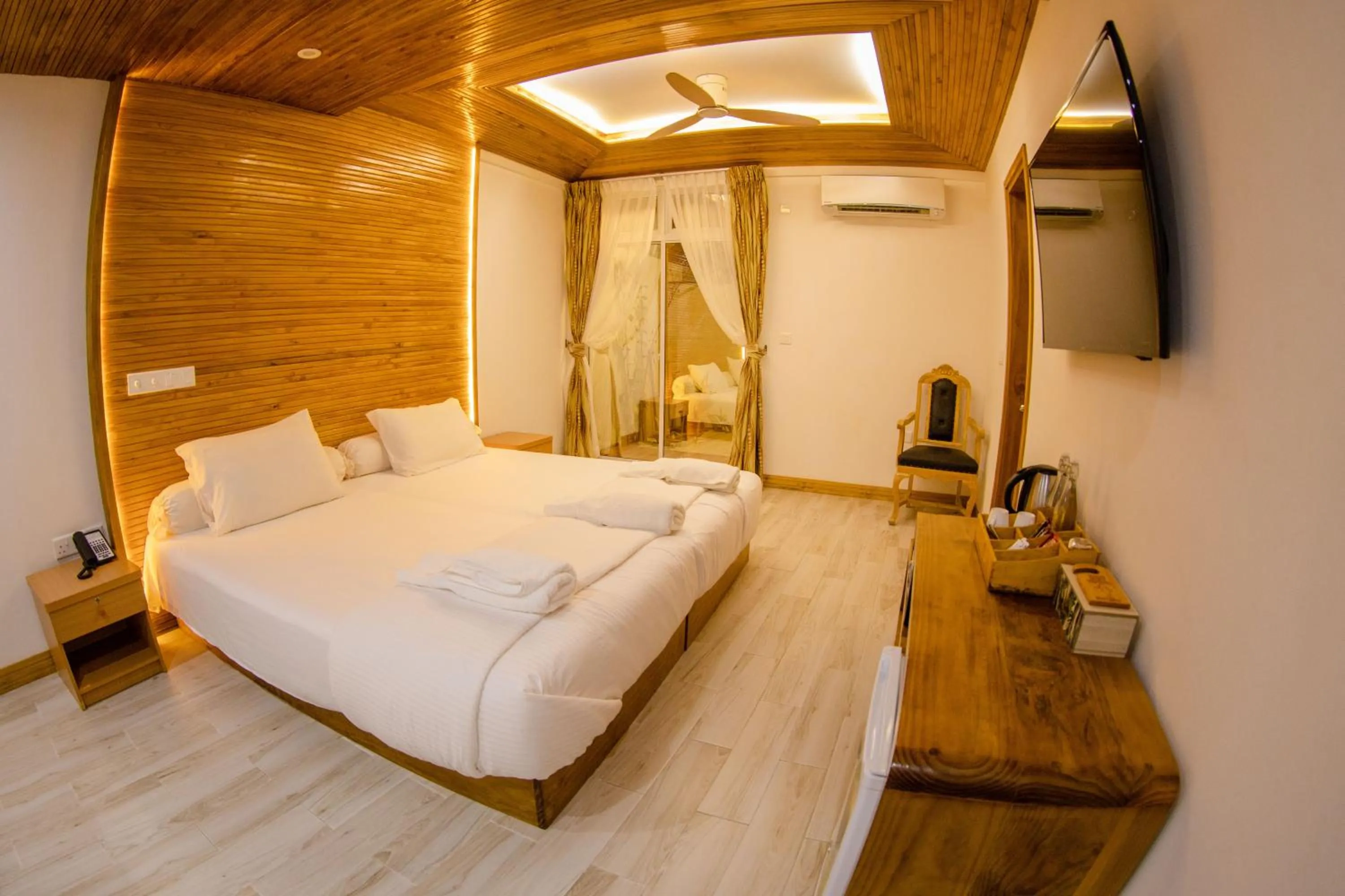 Photo of the whole room, Bed in PERLA Dhangethi