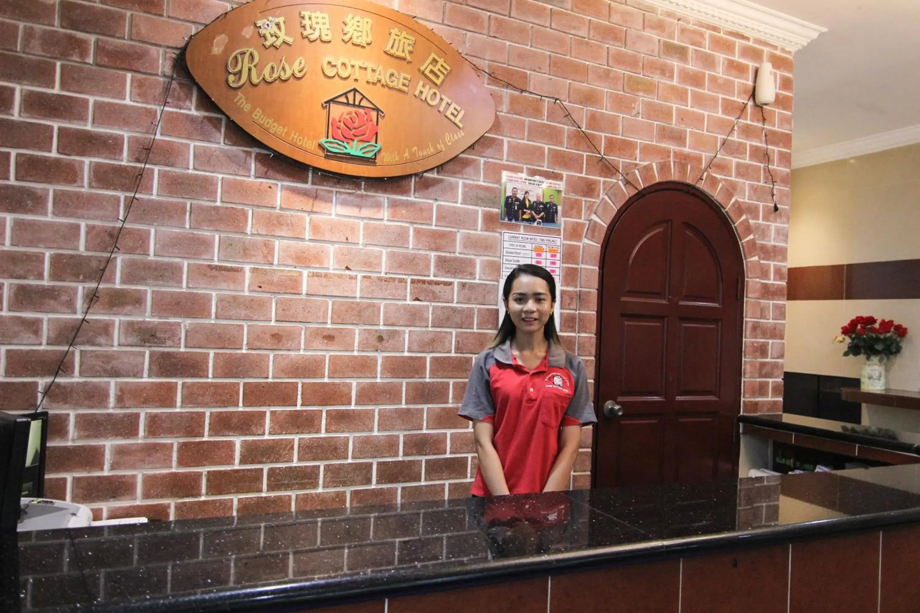 Staff in Rose Cottage Hotel Taman Perling Staff in Rose Cottage Hotel Taman Perling