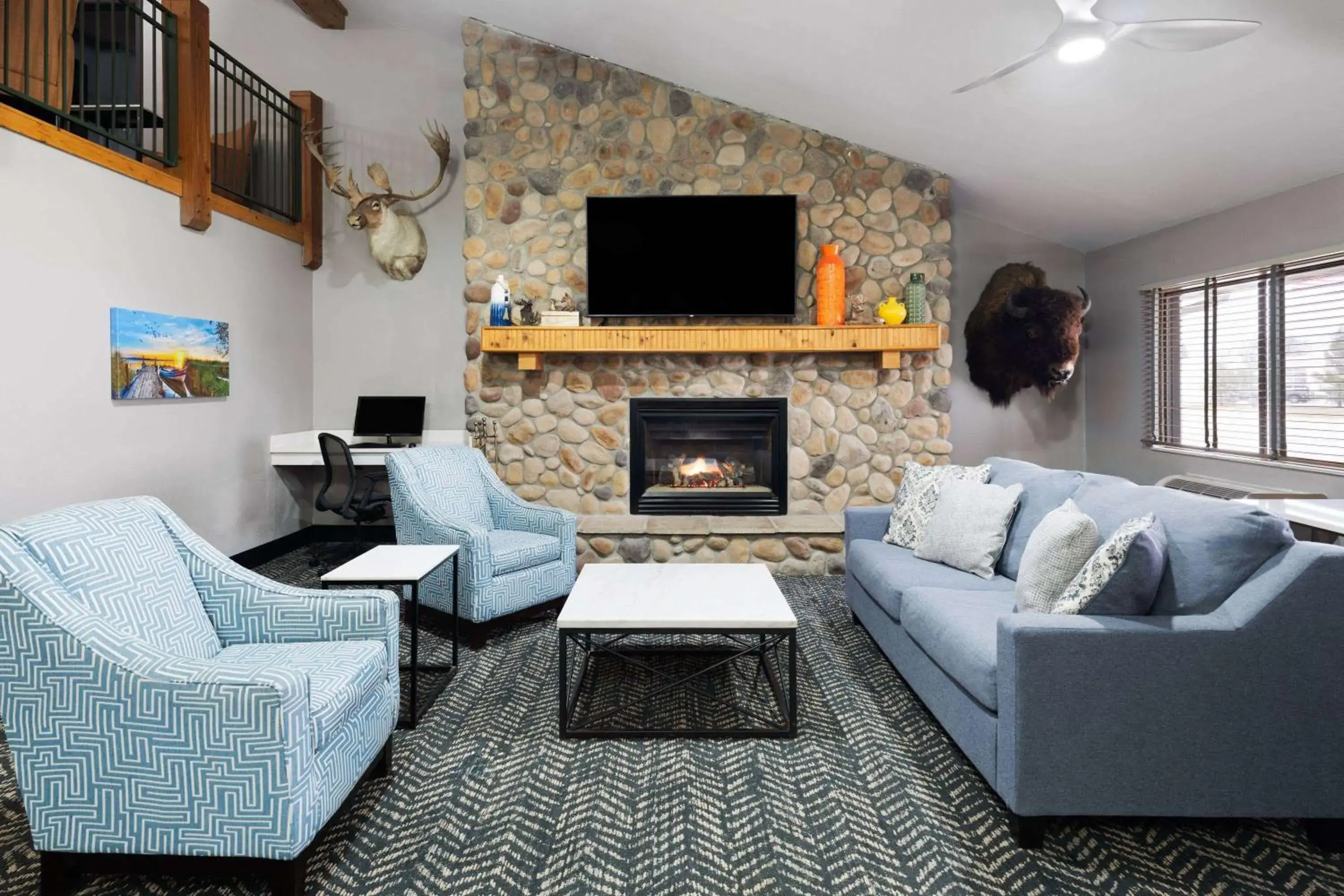 Lobby or reception in AmericInn by Wyndham Stuart Lobby or reception in AmericInn by Wyndham Stuart