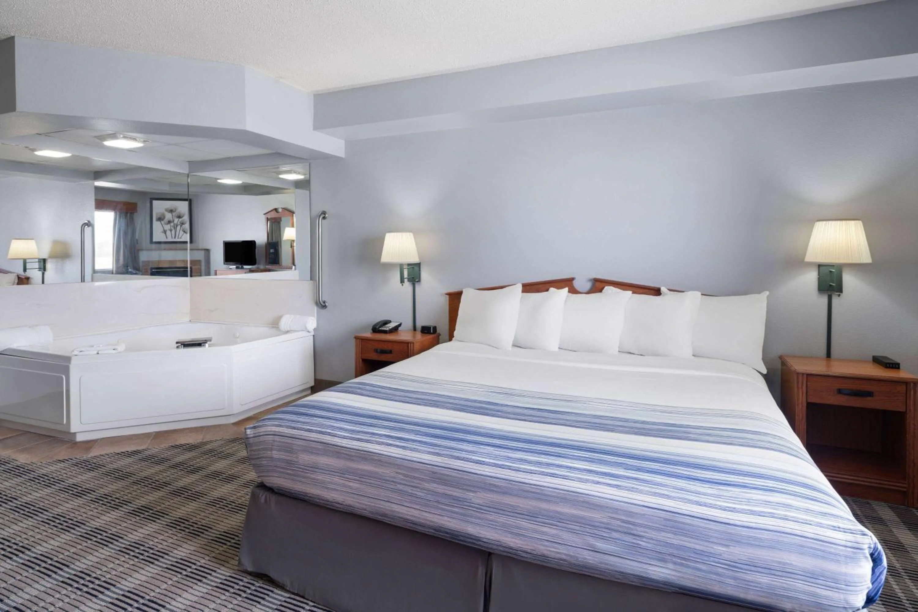 Photo of the whole room, Bed in AmericInn by Wyndham Stuart