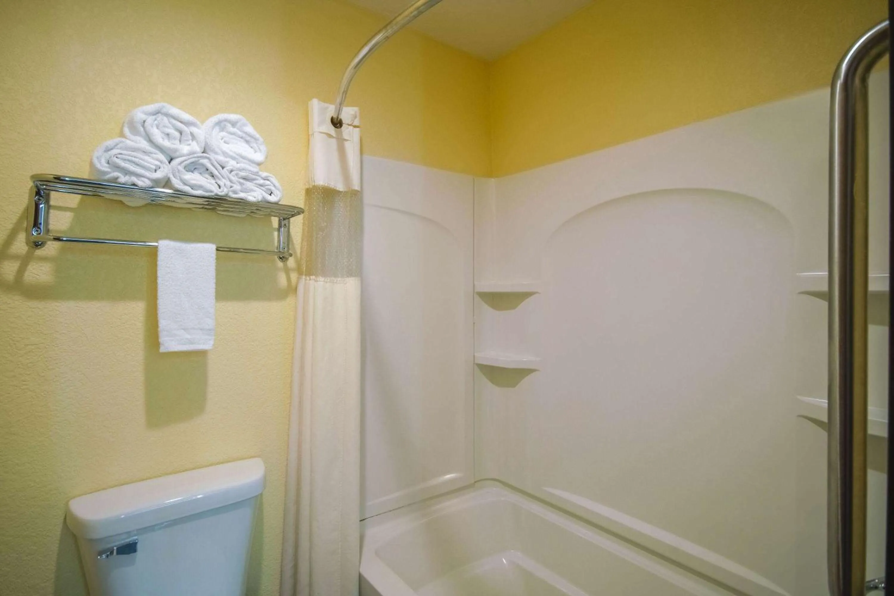 Bathroom in Days Inn by Wyndham Evansdale Waterloo