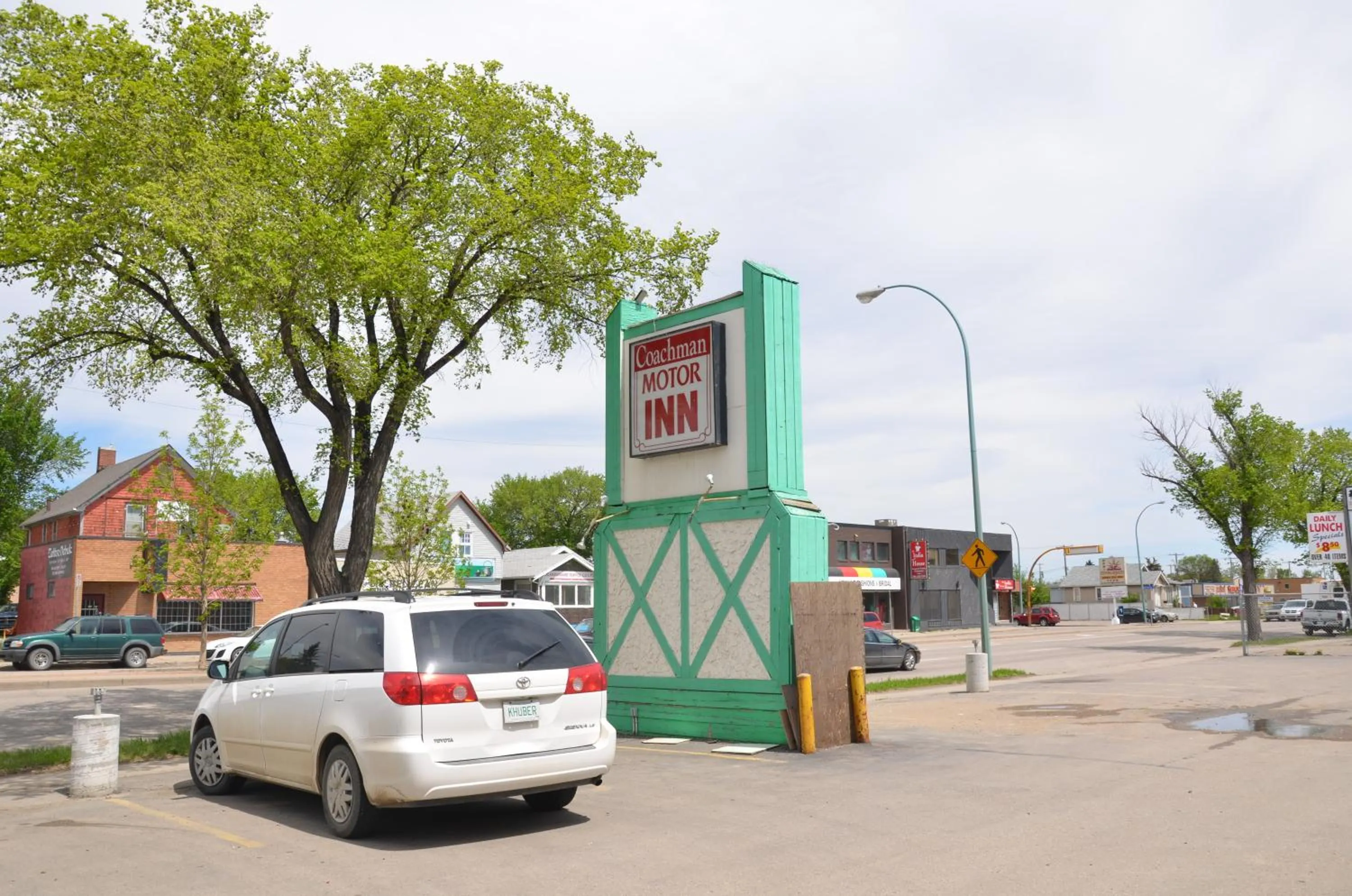 Logo/Certificate/Sign in Coachman Inn