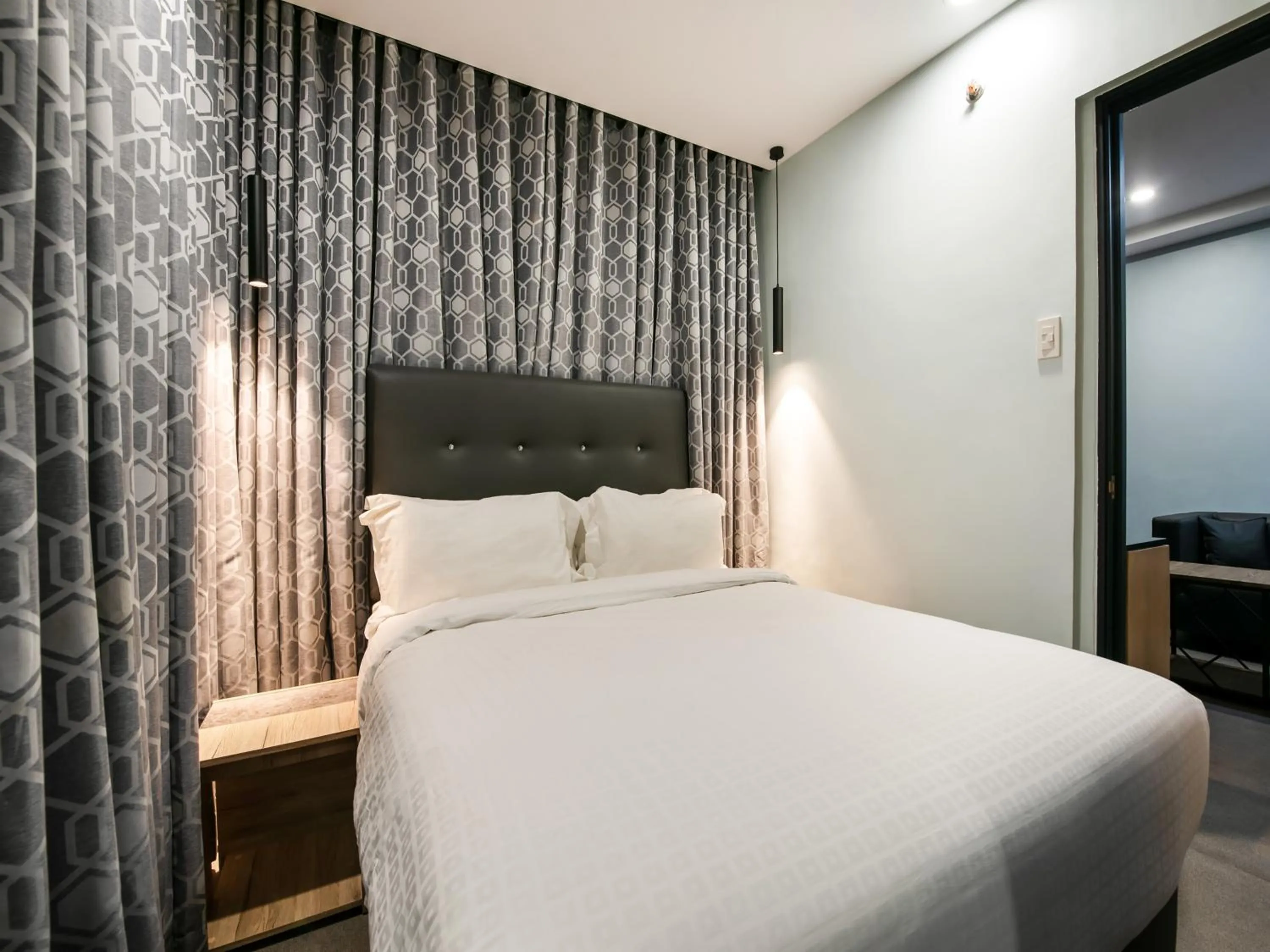 Bed in Bay Area Suites Manila